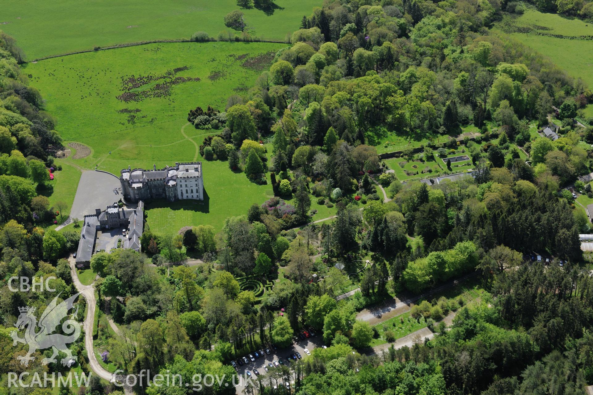 Picton Castle and gardens, Slebech. Oblique aerial photograph taken during the Royal Commission's programme of archaeological aerial reconnaissance by Toby Driver on 13th May 2015.