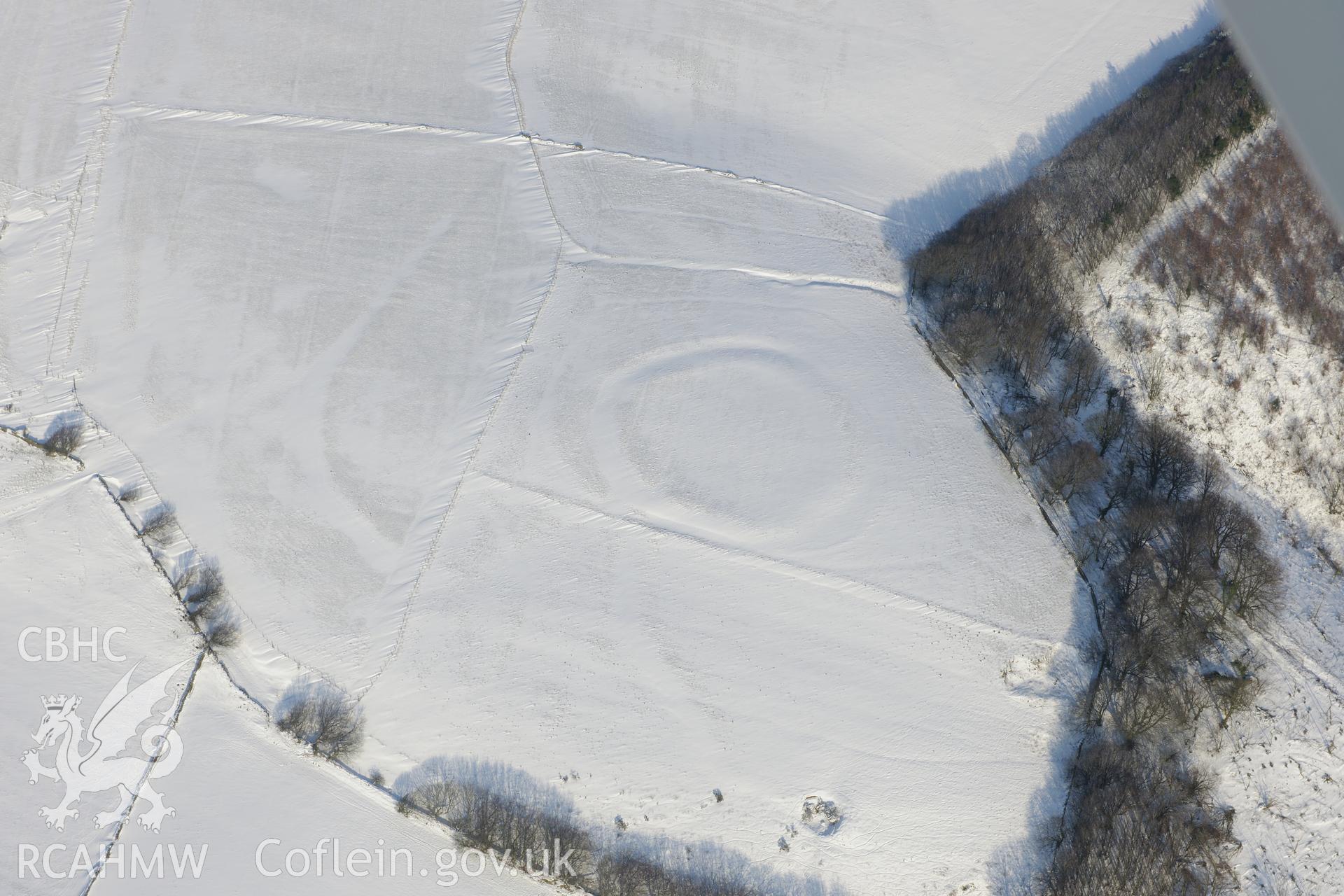 Ton Mawr enclosure, east of Margam, Port Talbot. Oblique aerial photograph taken during the Royal Commission?s programme of archaeological aerial reconnaissance by Toby Driver on 24th January 2013.