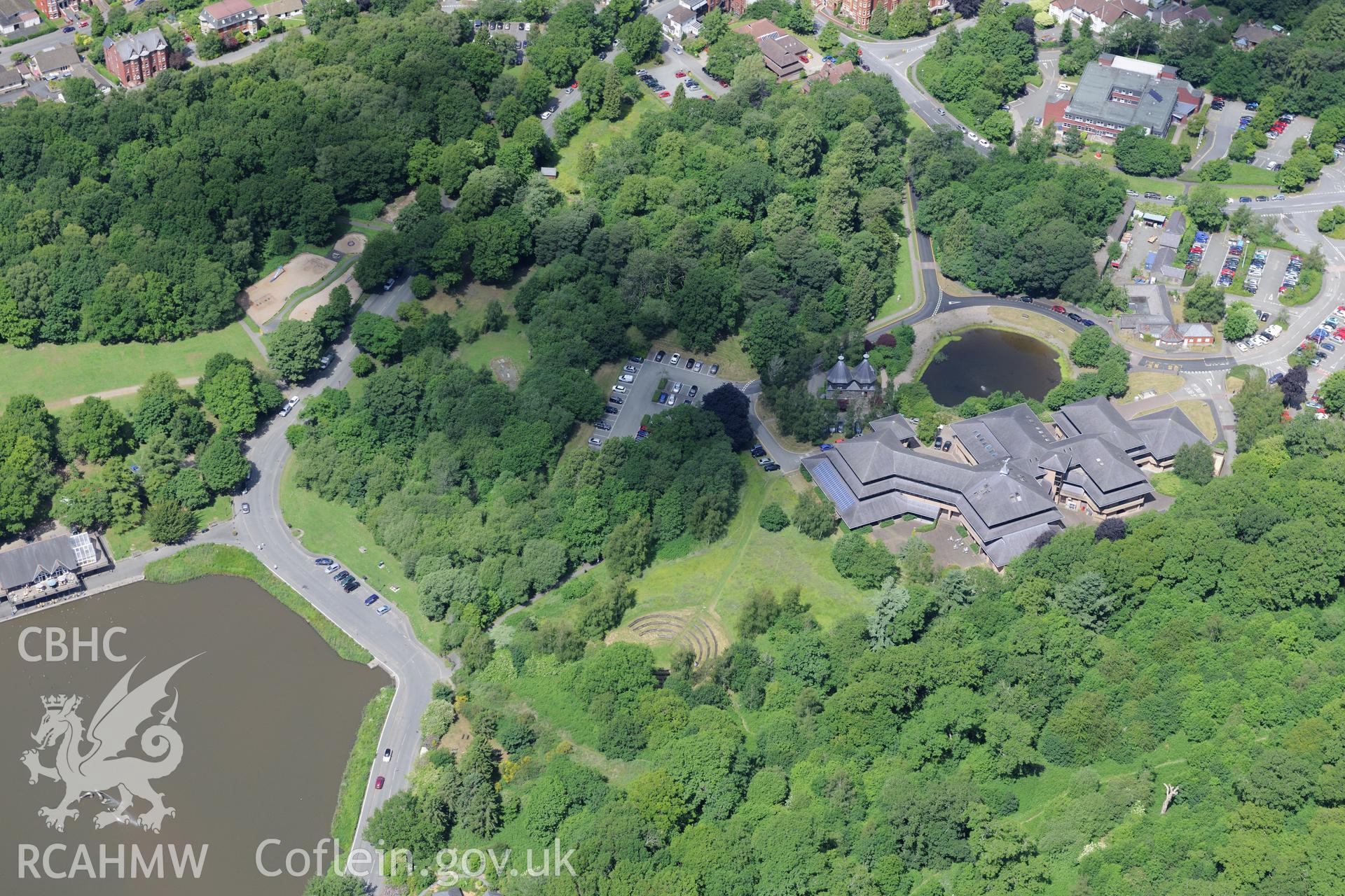 Powys County Hall, Lake Cottage and the site of Pump House and Pump House Hotel, Llandrindod Wells. Oblique aerial photograph taken during the Royal Commission's programme of archaeological aerial reconnaissance by Toby Driver on 30th June 2015.