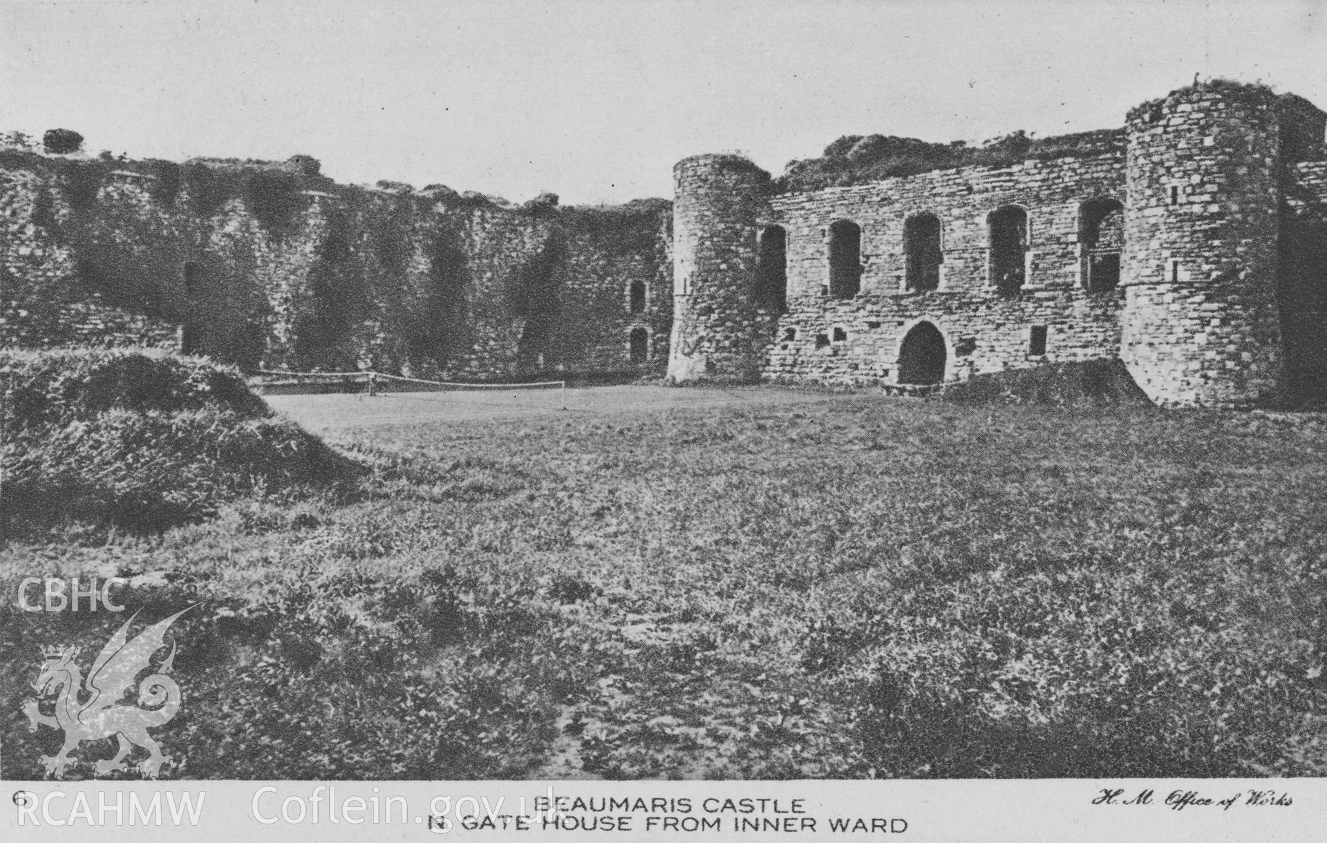 Digital copy of a postcard view of the gatehouse at Beaumaris Castle.