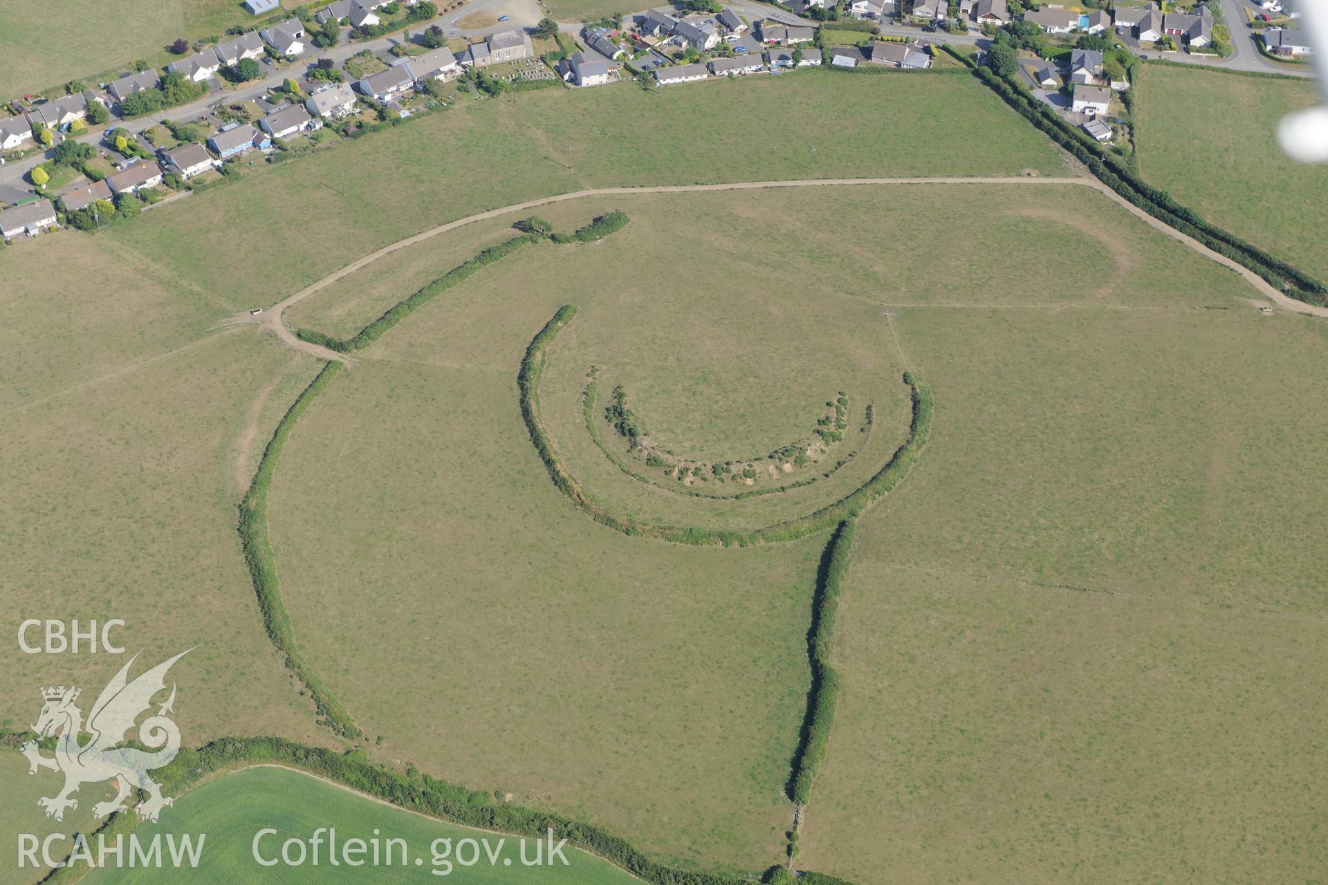 Keeston Castle hillfort, north west of Haverford West. Oblique aerial photograph taken during the Royal Commission?s programme of archaeological aerial reconnaissance by Toby Driver on 16th July 2013.