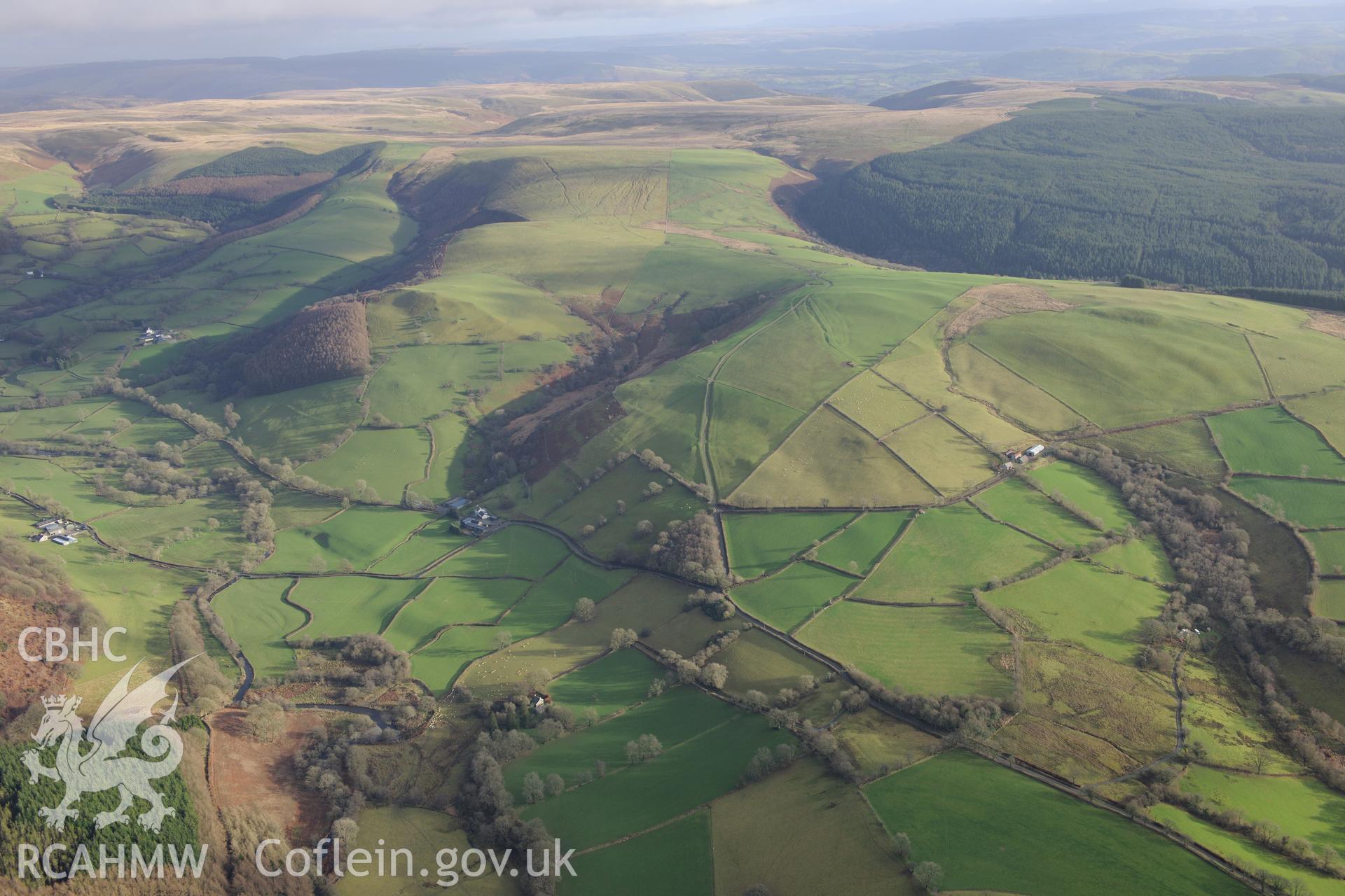 View of the Dolcothau landscape with Roman Aqueducts visible. Oblique aerial photograph taken during the Royal Commission's programme of archaeological aerial reconnaissance by Toby Driver on 6th January 2015.