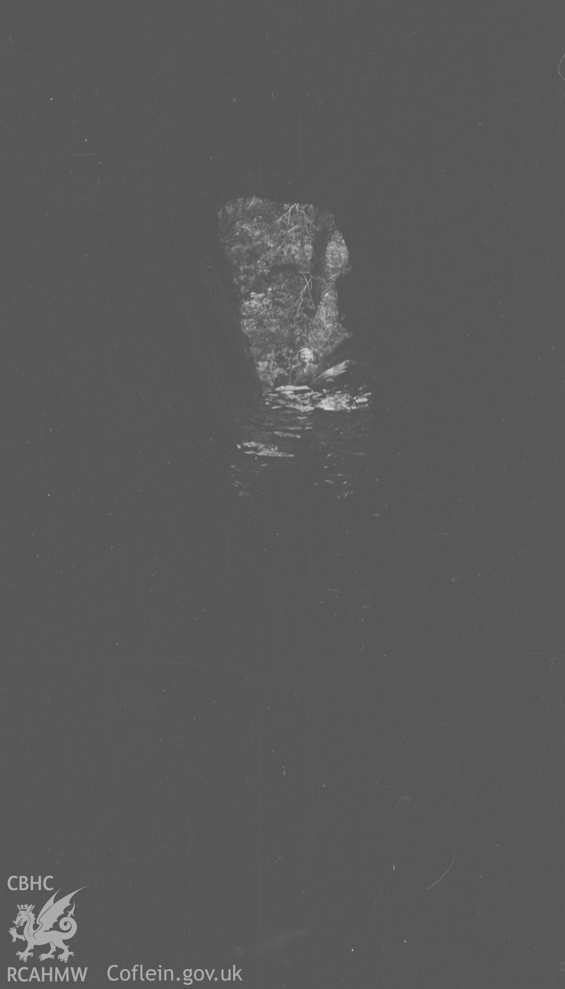 Digital copy of a black and white negative showing view of the waterfall from inside Robbers Cave, Hafod. Photographed by Arthur O. Chater in September 1964.