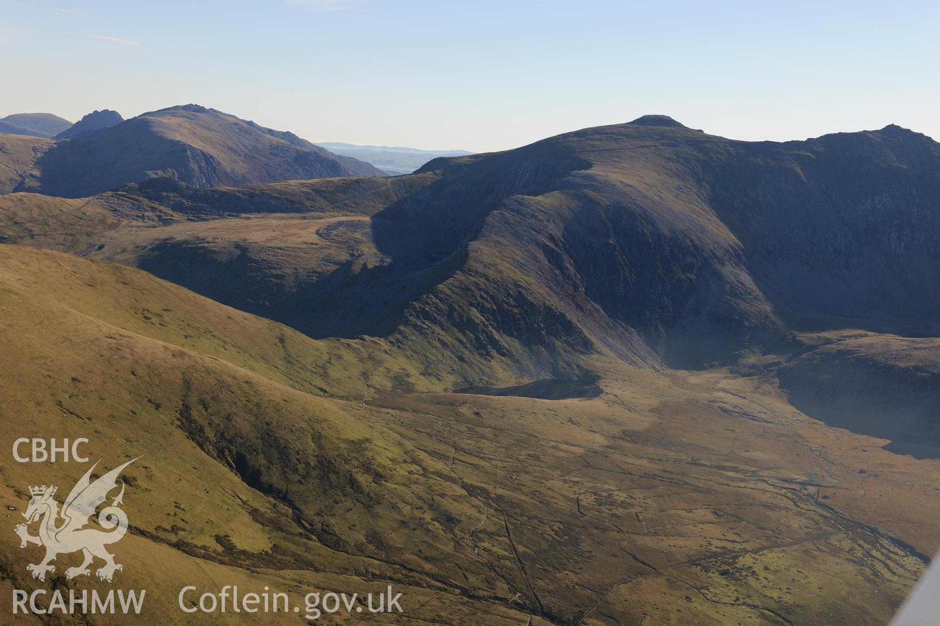 Snowdon Summit and the railway terminus, Snowdonia. Oblique aerial photograph taken during the Royal Commission's programme of archaeological aerial reconnaissance by Toby Driver on 2nd October 2015.