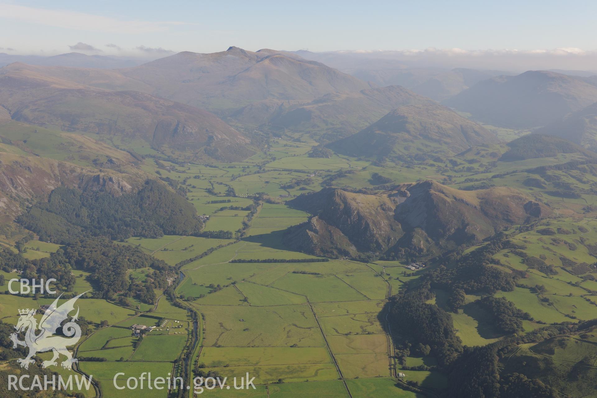 View of the Dysynni valley, including the hillfort on Bird's Rock, near Abergynolwyn. Oblique aerial photograph taken during the Royal Commission's programme of archaeological aerial reconnaissance by Toby Driver on 2nd October 2015.