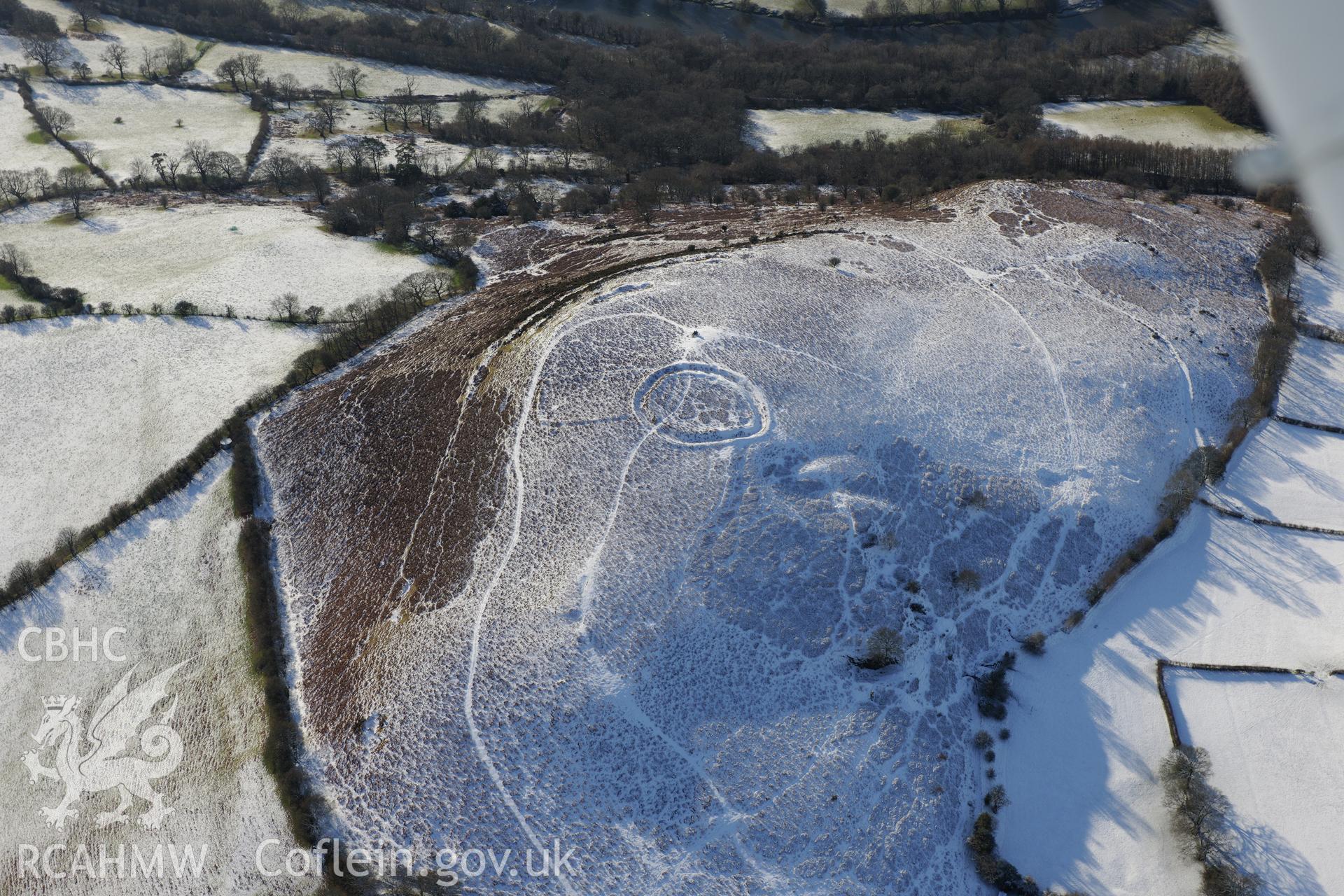 Twyn y Garth defended enclosure, Painscastle, south east of Builth Wells. Oblique aerial photograph taken during the Royal Commission?s programme of archaeological aerial reconnaissance by Toby Driver on 15th January 2013.