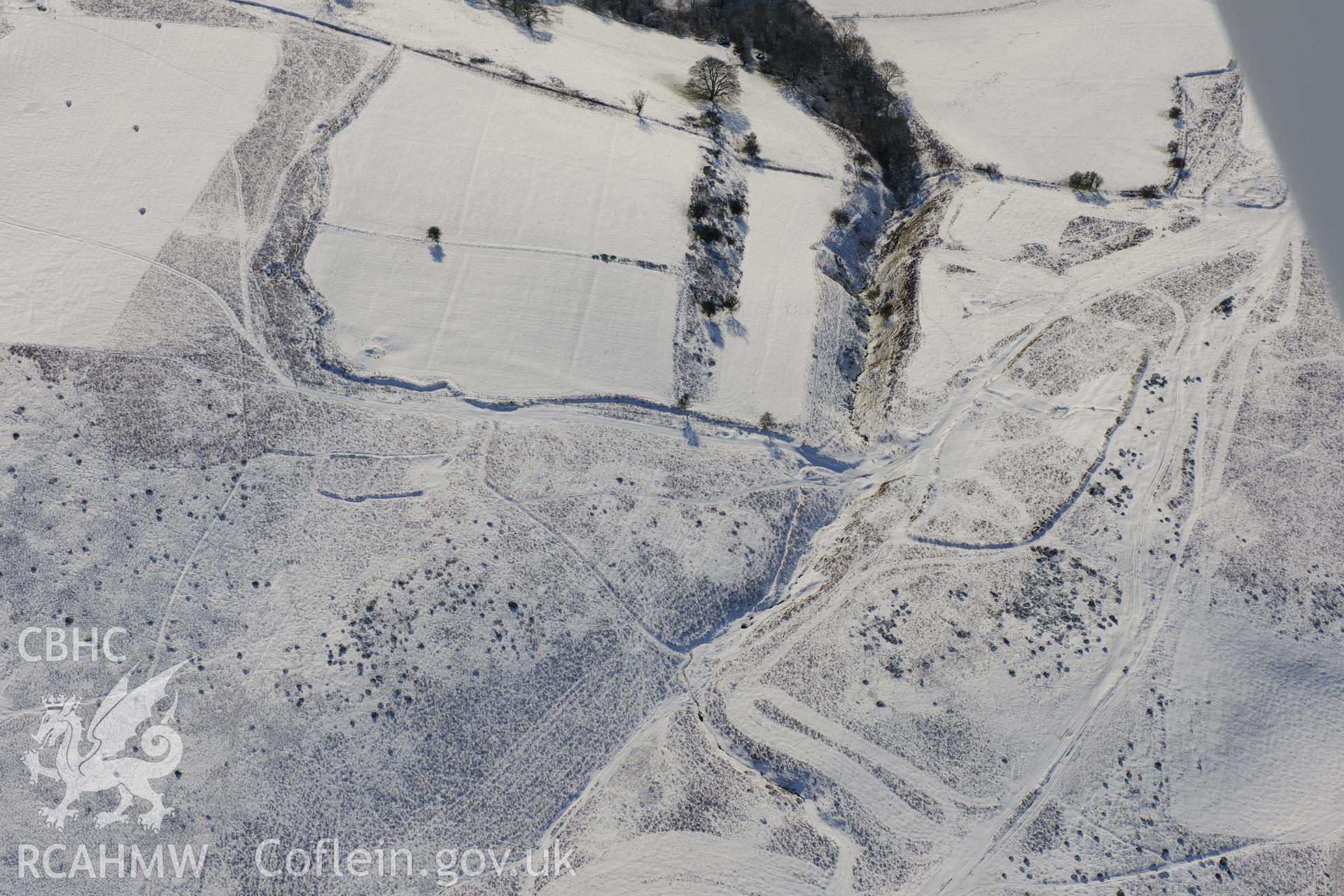 Deserted rural settlement on Aberedw Hill, east of Builth Wells. Oblique aerial photograph taken during the Royal Commission?s programme of archaeological aerial reconnaissance by Toby Driver on 15th January 2013.