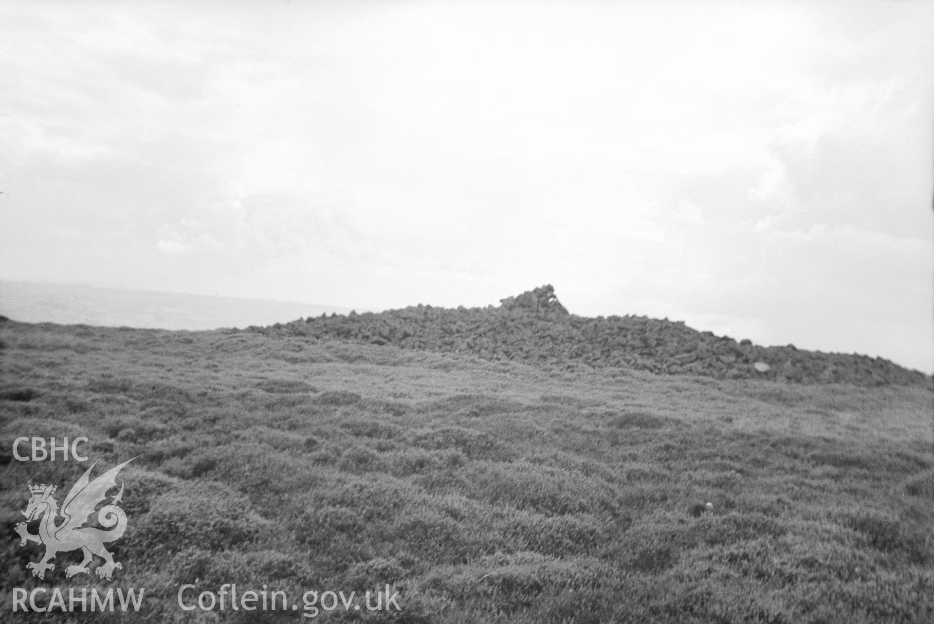 Digital copy of a nitrate negative showing Corndon Hill Cairns. From Cadw Monuments in Care  Collection.