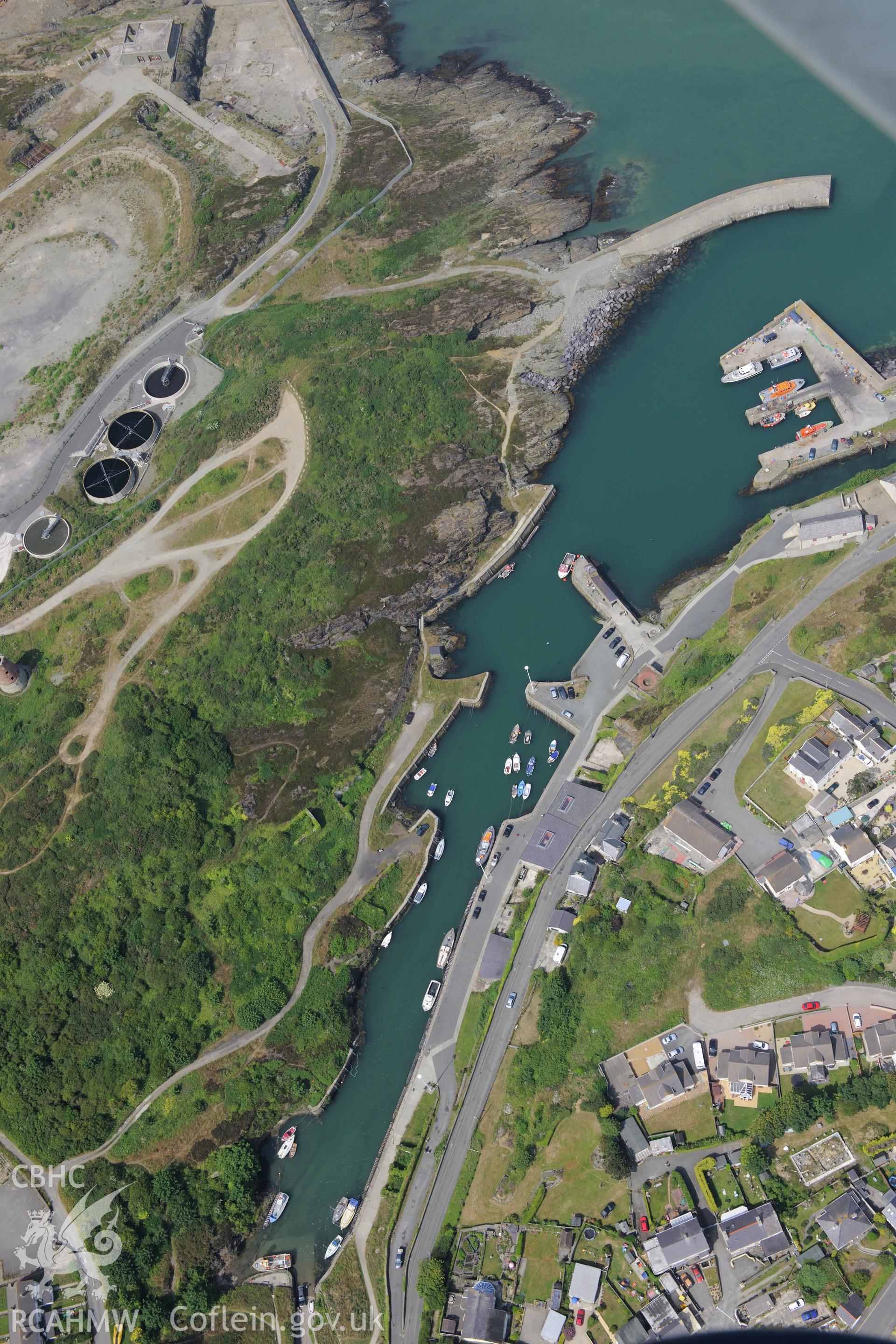 Amlwch harbour, Anglesey. Oblique aerial photograph taken during the Royal Commission?s programme of archaeological aerial reconnaissance by Toby Driver on 12th July 2013.