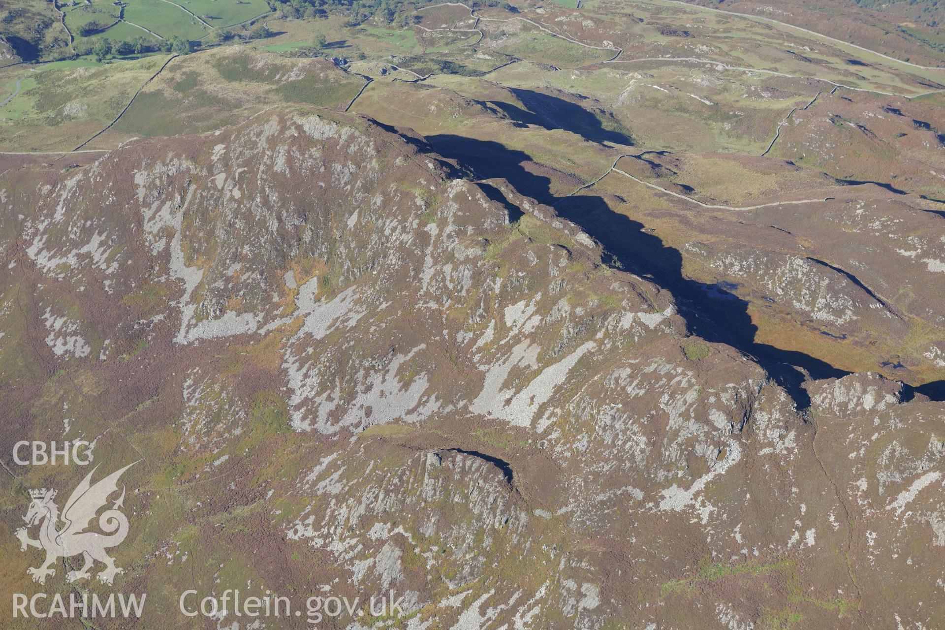 Pared y Cefnhir hillfort, about halfway between Dolgellau and Fairbourne. Oblique aerial photograph taken during the Royal Commission's programme of archaeological aerial reconnaissance by Toby Driver on 2nd October 2015.