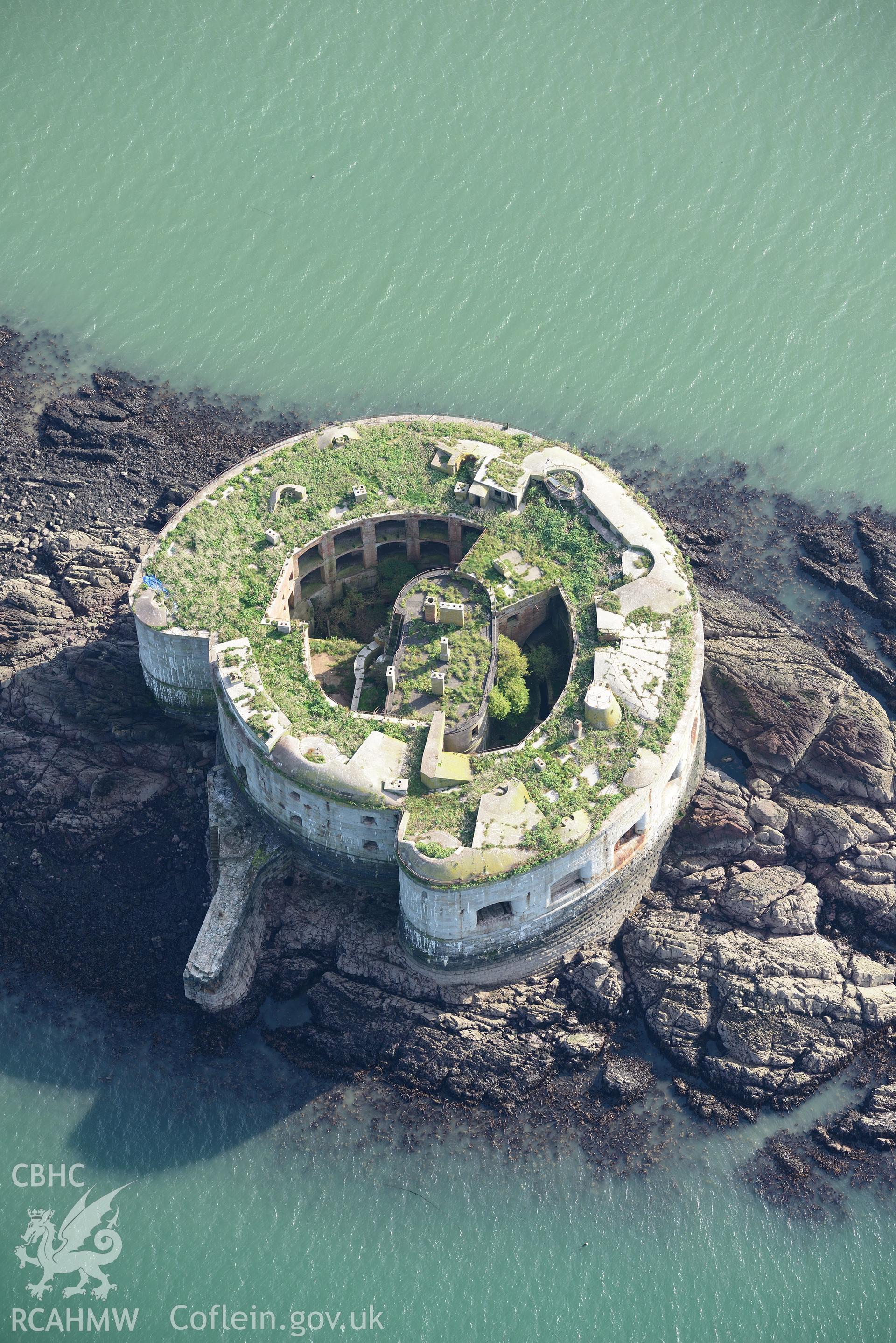 Stack Rock Fort, Milford Haven. Oblique aerial photograph taken during the Royal Commission's programme of archaeological aerial reconnaissance by Toby Driver on 30th September 2015.