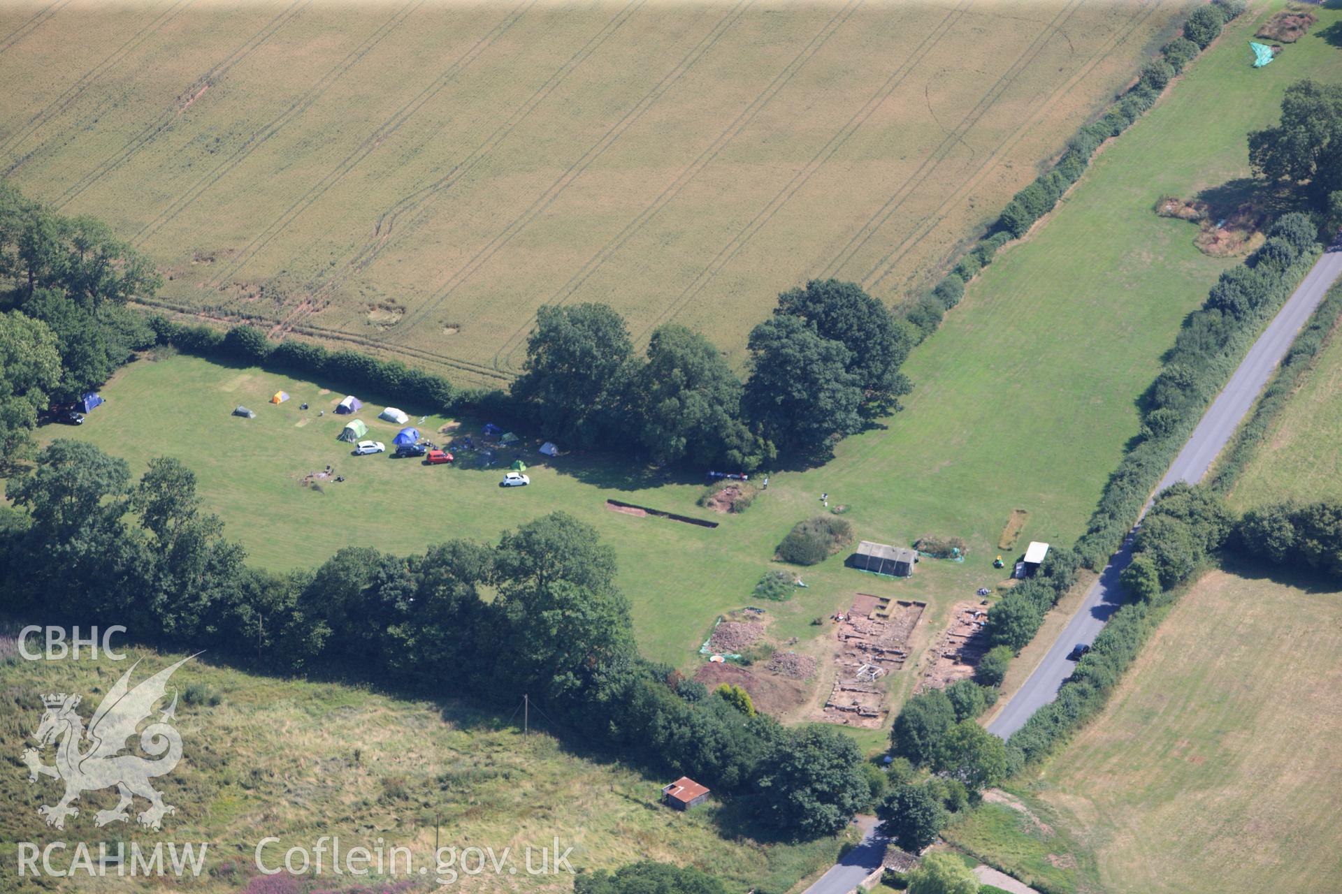 Excavations immediately south of Trellech shrunken medieval village. Oblique aerial photograph taken during the Royal Commission?s programme of archaeological aerial reconnaissance by Toby Driver on 1st August 2013.