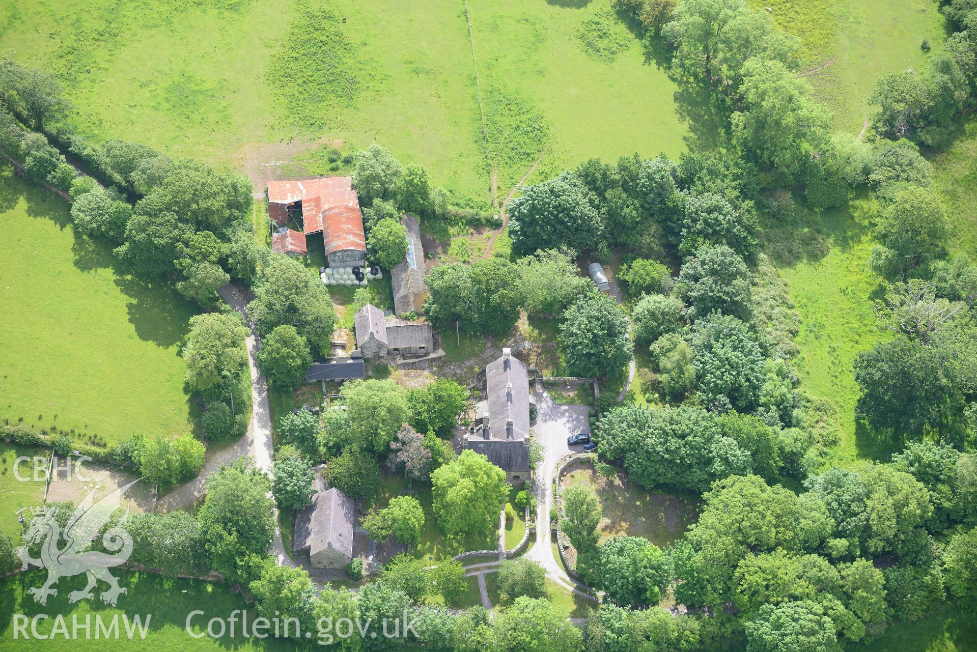 Penarth Fawr hall, stables and granary, near Chwilog. Oblique aerial photograph taken during the Royal Commission's programme of archaeological aerial reconnaissance by Toby Driver on 23rd June 2015.