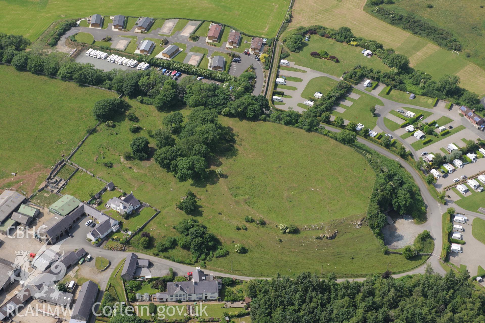 Parciau Hillfort - possible site of Roman building near Moelfre, Anglesey. Oblique aerial photograph taken during the Royal Commission?s programme of archaeological aerial reconnaissance by Toby Driver on 12th July 2013.