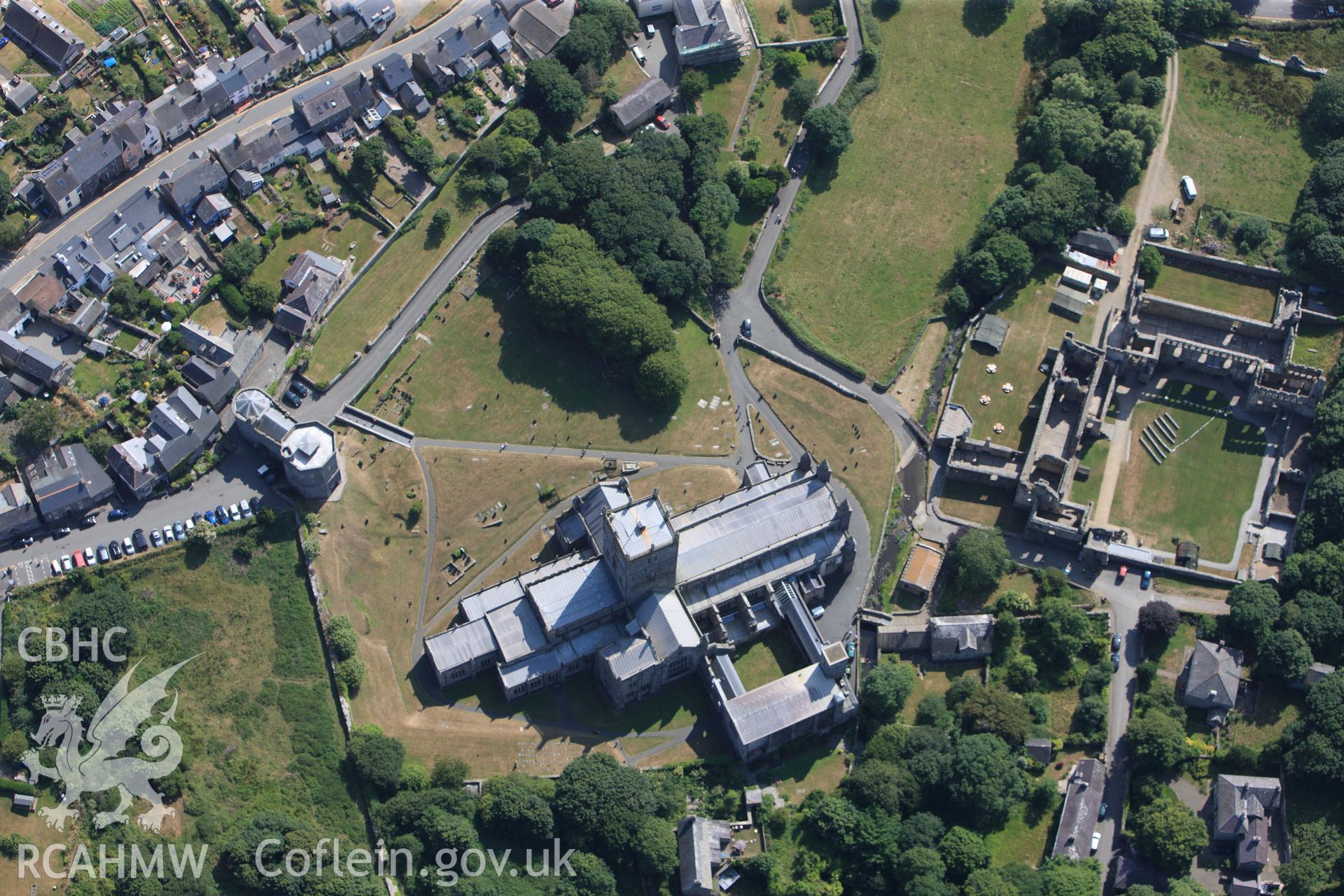 St Davids Cathedral, St Davids Bishops Palace and St Davids Close, Porth y Twr. Oblique aerial photograph taken during the Royal Commission?s programme of archaeological aerial reconnaissance by Toby Driver on 16th July 2013.