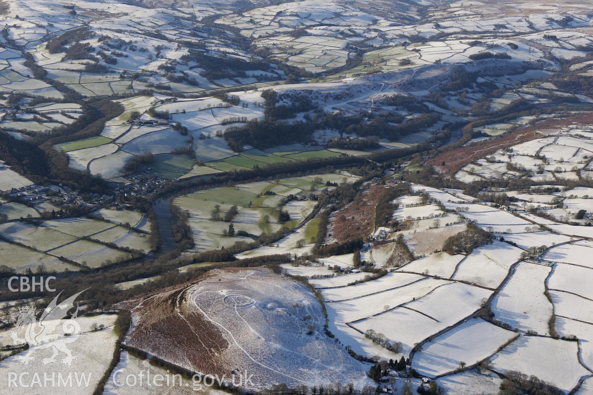 Twyn y Garth defended enclosure, Painscastle, south east of Builth Wells. Oblique aerial photograph taken during the Royal Commission?s programme of archaeological aerial reconnaissance by Toby Driver on 15th January 2013.