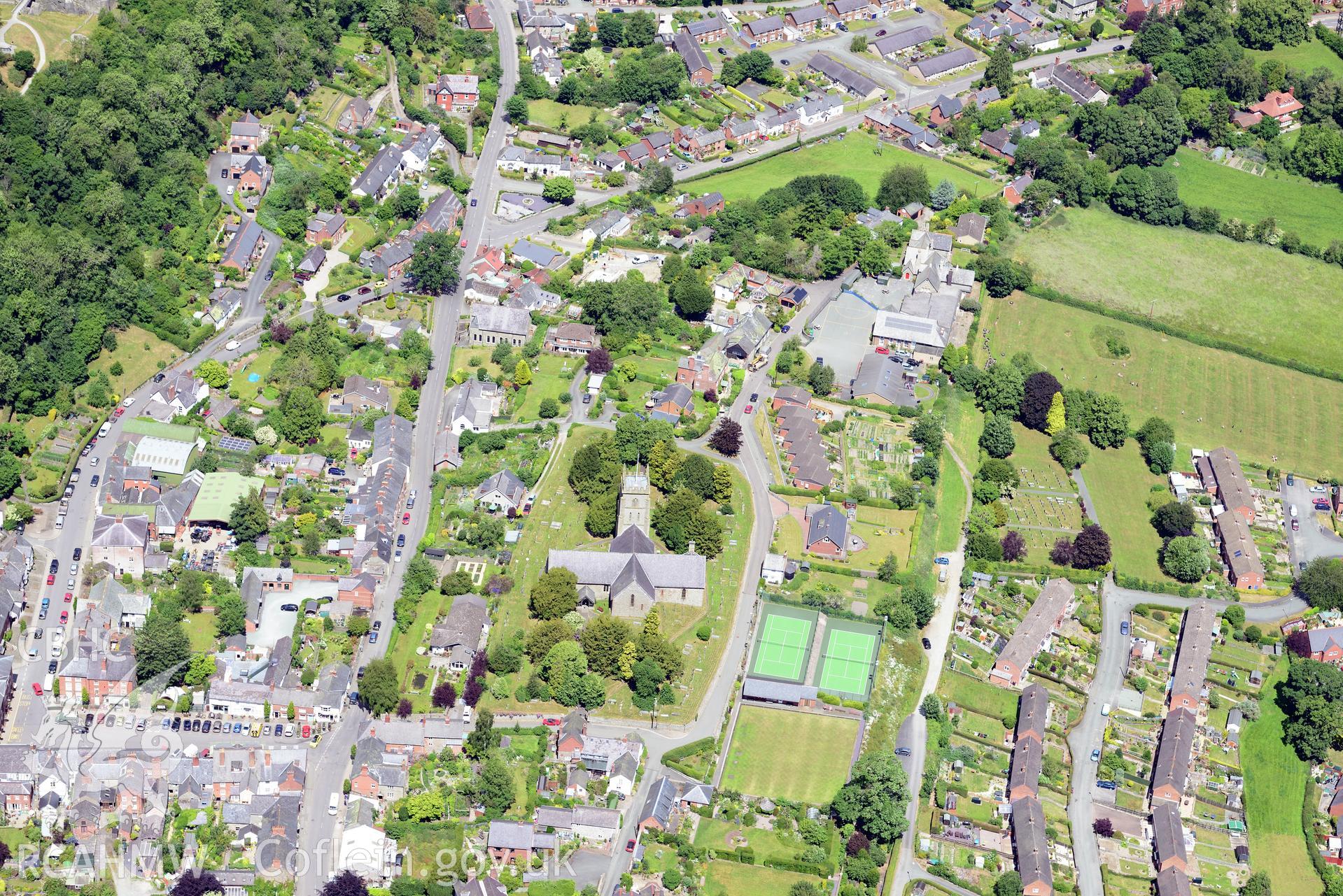 St. Nicholas' church in the town of Montgomery, north east of Newtown. Oblique aerial photograph taken during the Royal Commission's programme of archaeological aerial reconnaissance by Toby Driver on 30th June 2015.