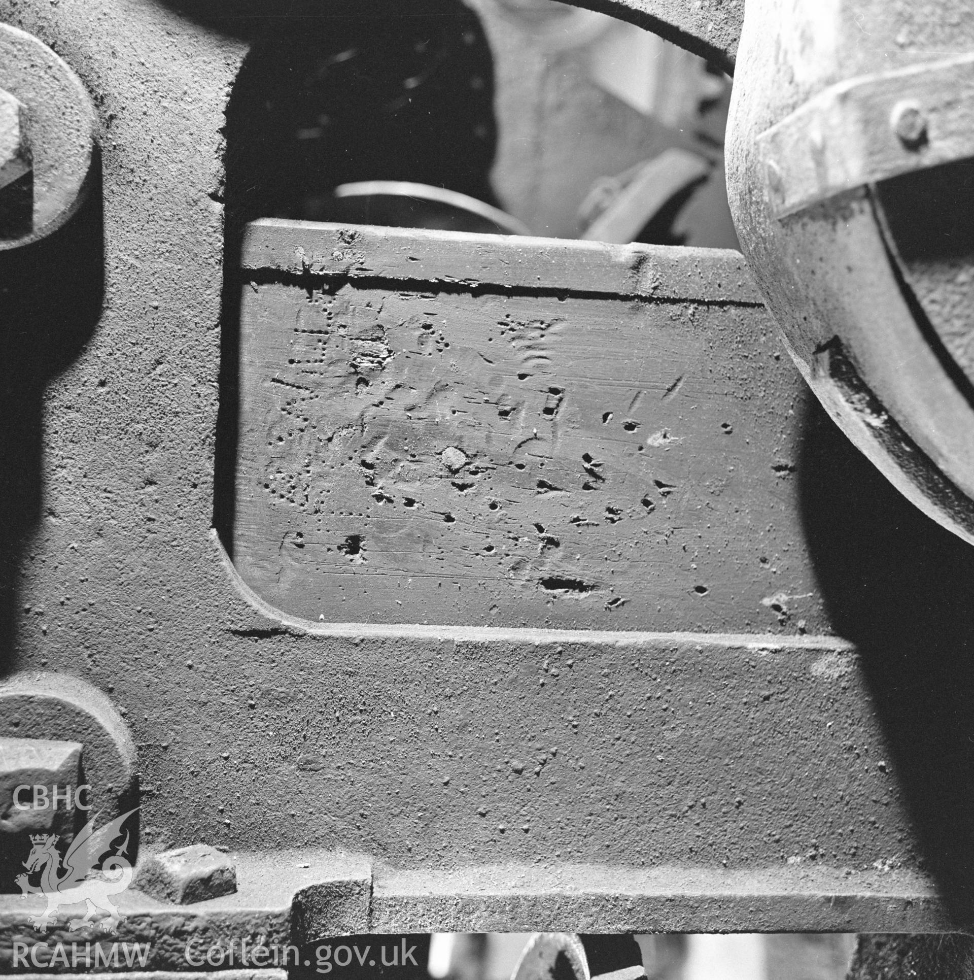 Digital copy of a black and white negative showing detail of the crane at Player's Works Foundry, Clydach, taken by RCAHMW, undated