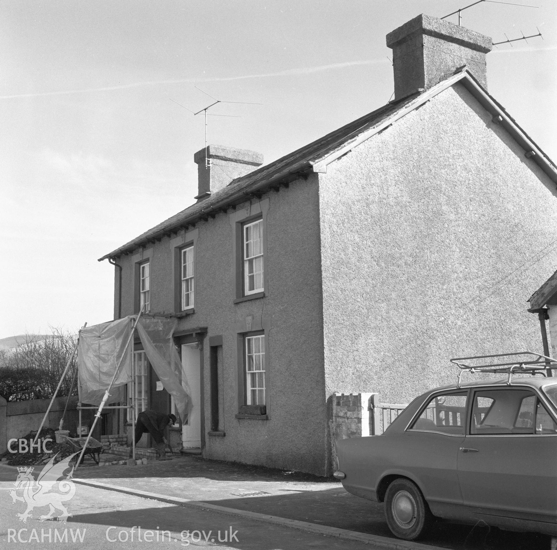 Digital copy of a nitrate negative showing exterior view of shop at Devils Bridge.