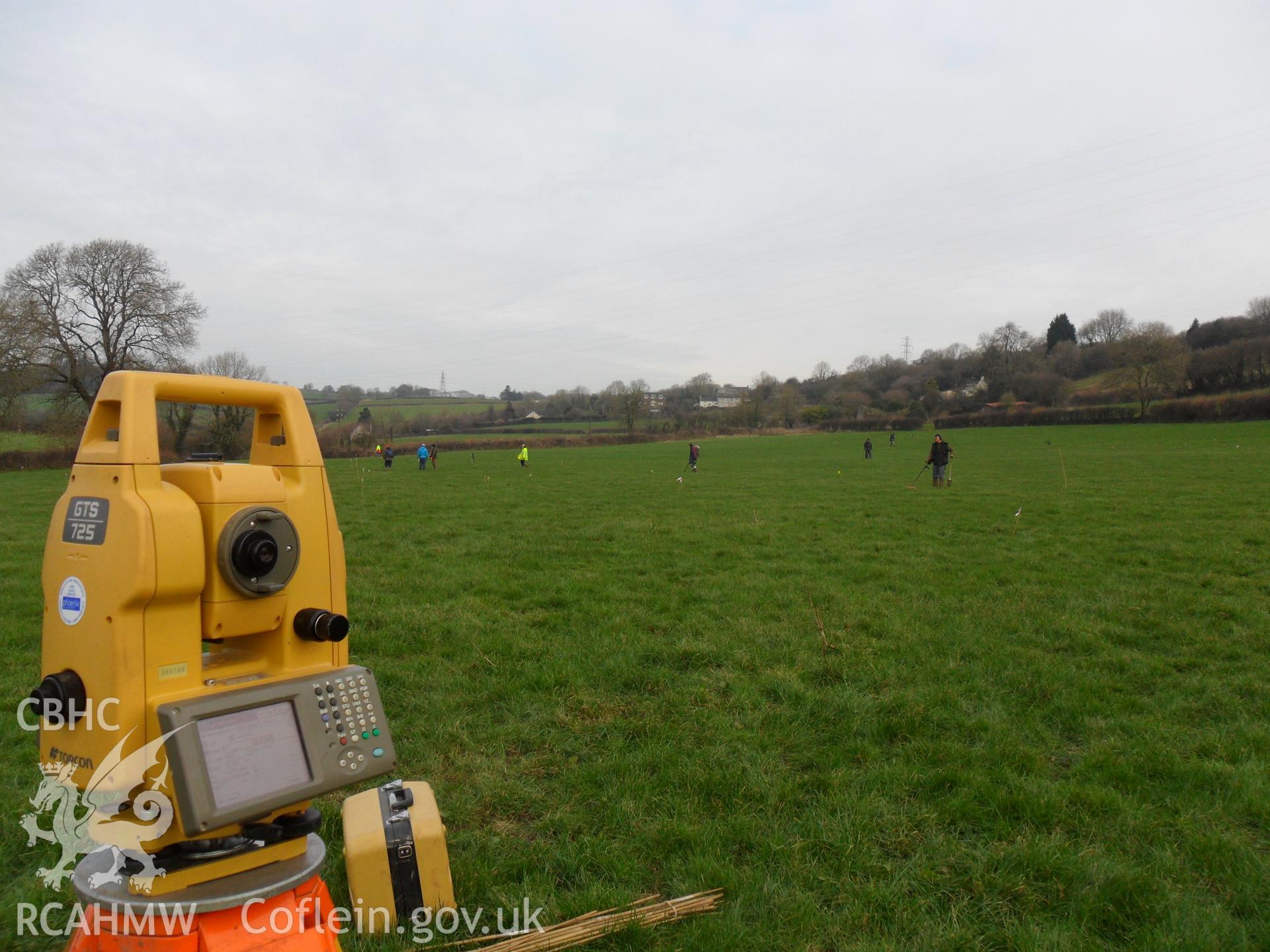 Digital colour photograph of archaeological investigation at Maes Gwenllian battlefield. From report no. 1050 - Maes Gwenllian battlefield, part of the Welsh Battlefield Metal Detector Survey, carried out by Archaeology Wales.