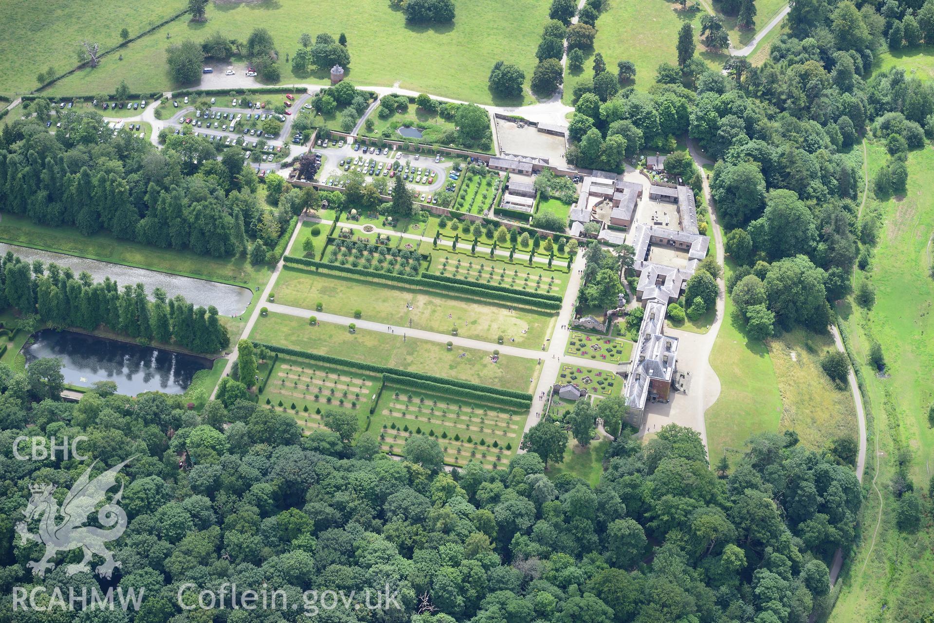 Erddig Hall including garden, stables and gardener's cottage. Oblique aerial photograph taken during the Royal Commission's programme of archaeological aerial reconnaissance by Toby Driver on 30th July 2015.