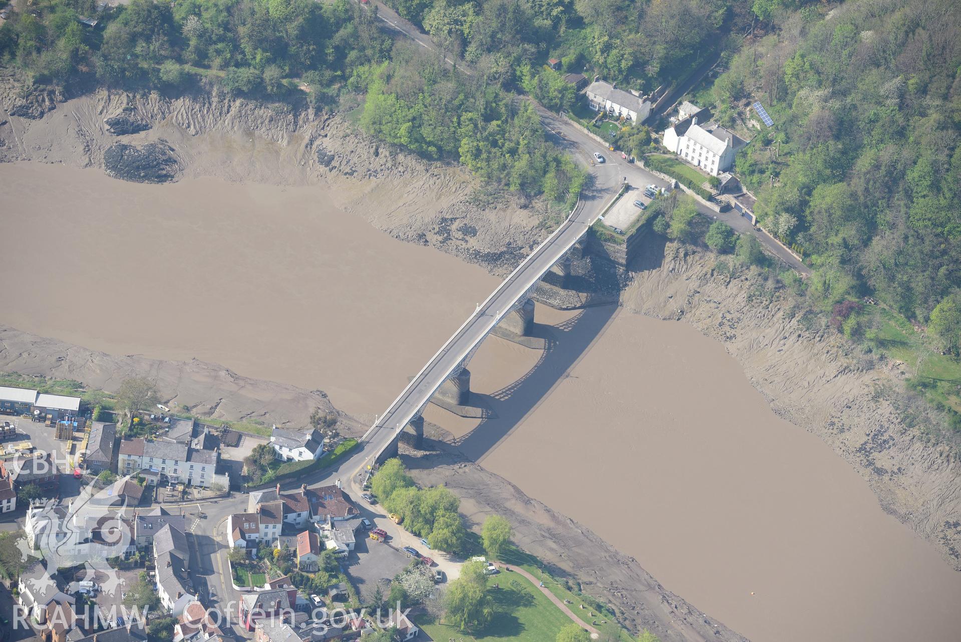 Chepstow including views of the Old Bridge, the Road Bridge and Wyecliffe House. Oblique aerial photograph taken during the Royal Commission's programme of archaeological aerial reconnaissance by Toby Driver on 21st April 2015.