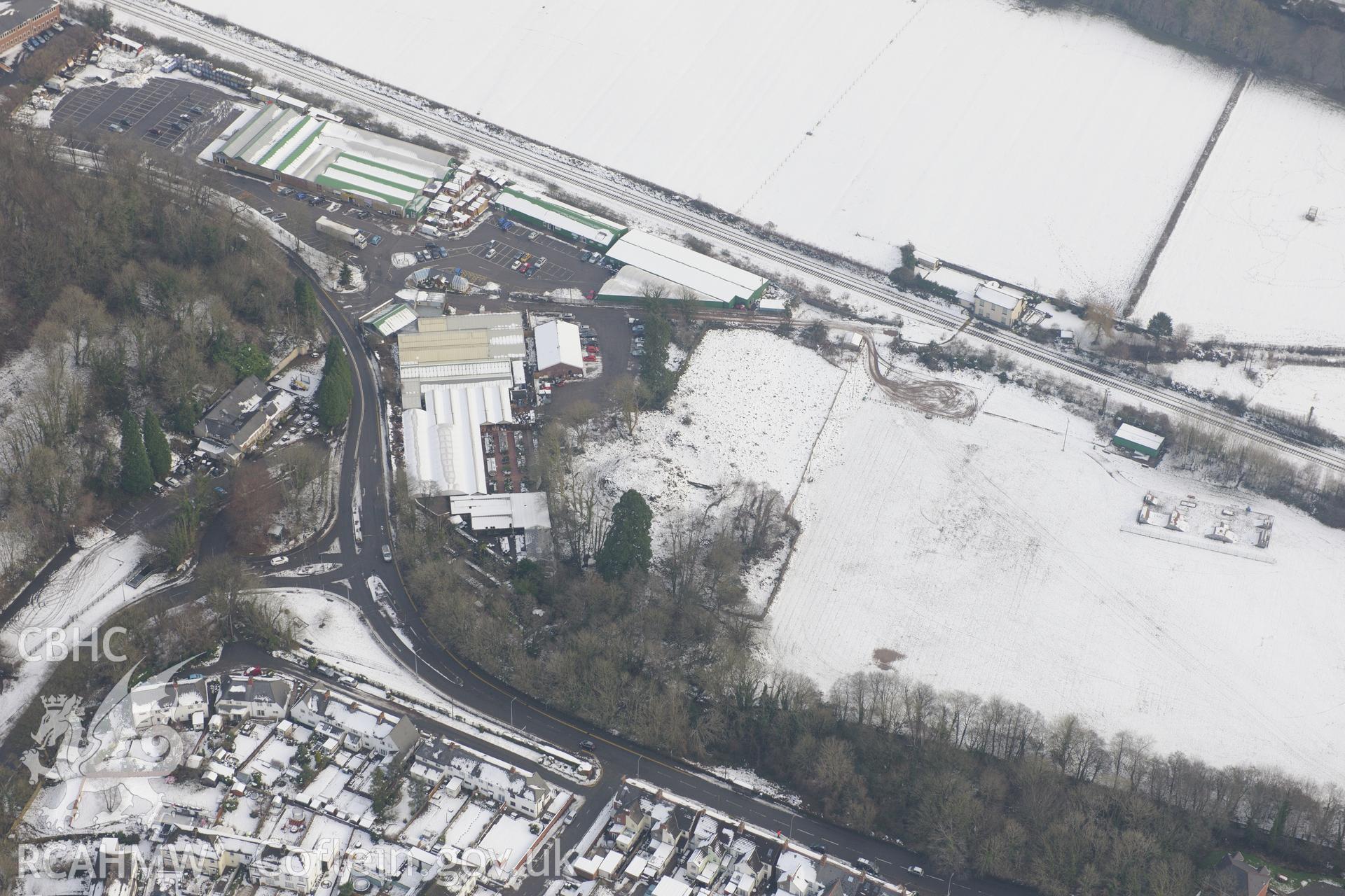 Ty Nant motte, Morganstown, on the north western edge of Cardiff. Oblique aerial photograph taken during the Royal Commission?s programme of archaeological aerial reconnaissance by Toby Driver on 24th January 2013.