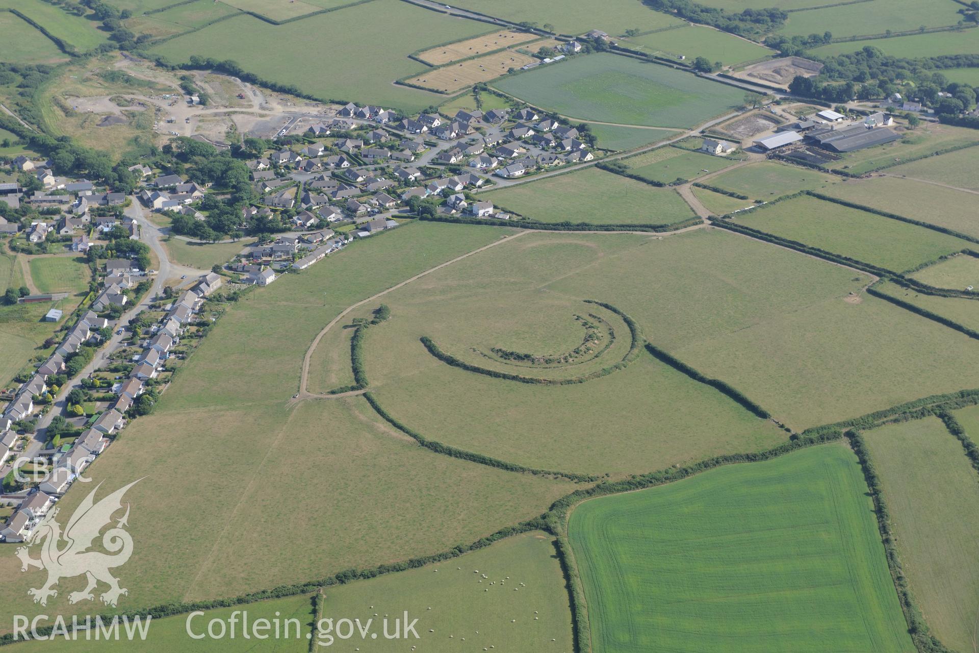 Keeston Castle hillfort, north west of Haverford West. Oblique aerial photograph taken during the Royal Commission?s programme of archaeological aerial reconnaissance by Toby Driver on 16th July 2013.