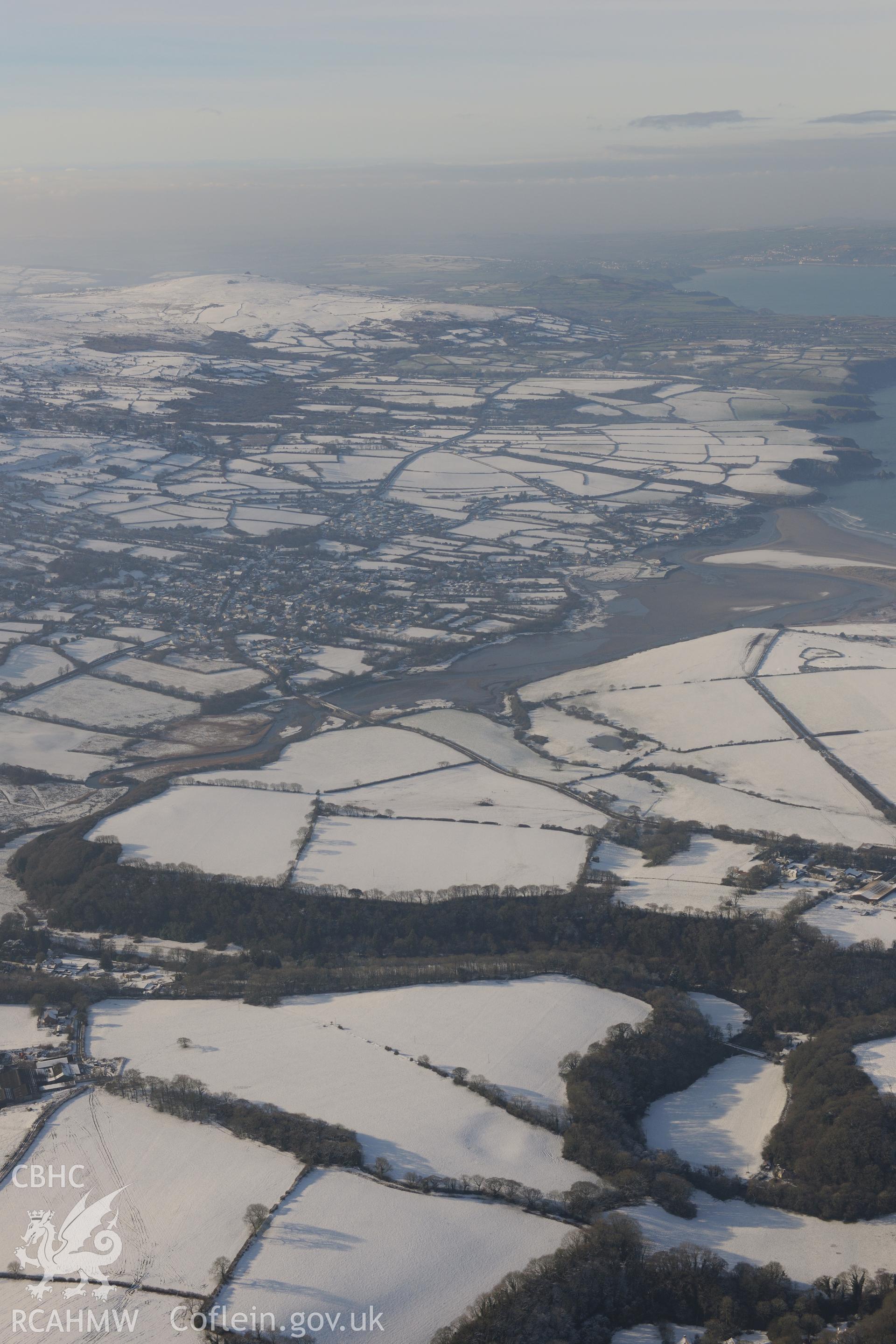 Newport, Pembrokeshire. Oblique aerial photograph taken during the Royal Commission?s programme of archaeological aerial reconnaissance by Toby Driver on 24th January 2013.