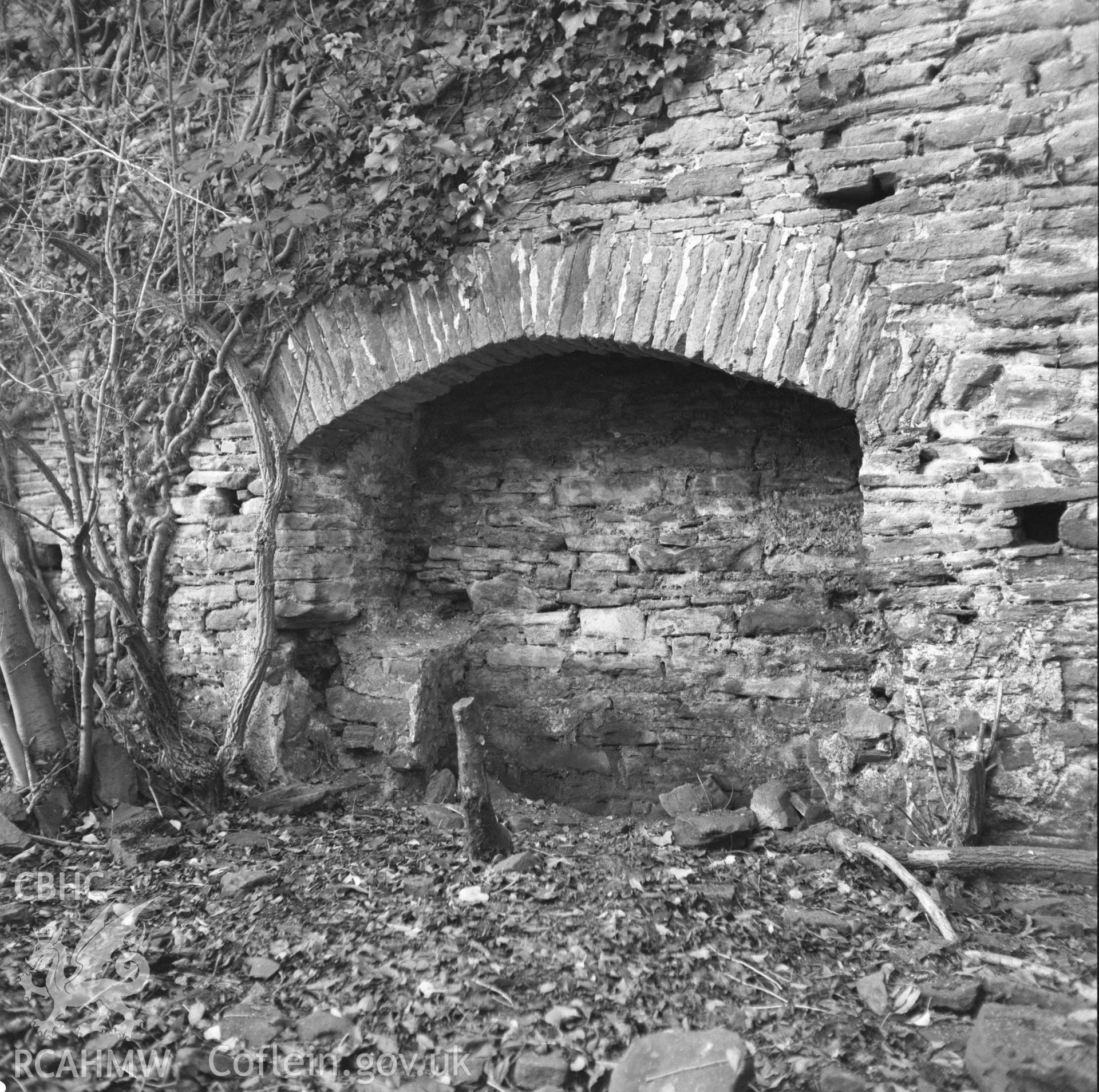 Digital copy of a black and white negative showing fireplace at Plas y Betws, taken by Harry Brooksby, 26th November 1965