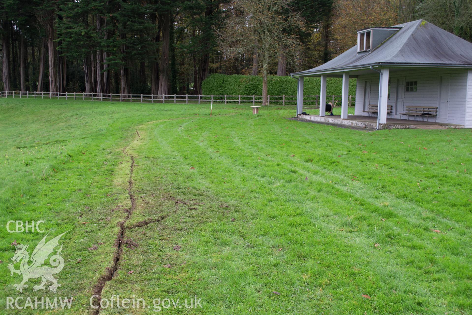 General view from north west of cable route post-excavation. Photographed during archaeological watching brief of Plas Newydd, Ynys Mon, conducted by Gwynedd Archaeological Trust, on 14th November 2017. Project no. 2542.