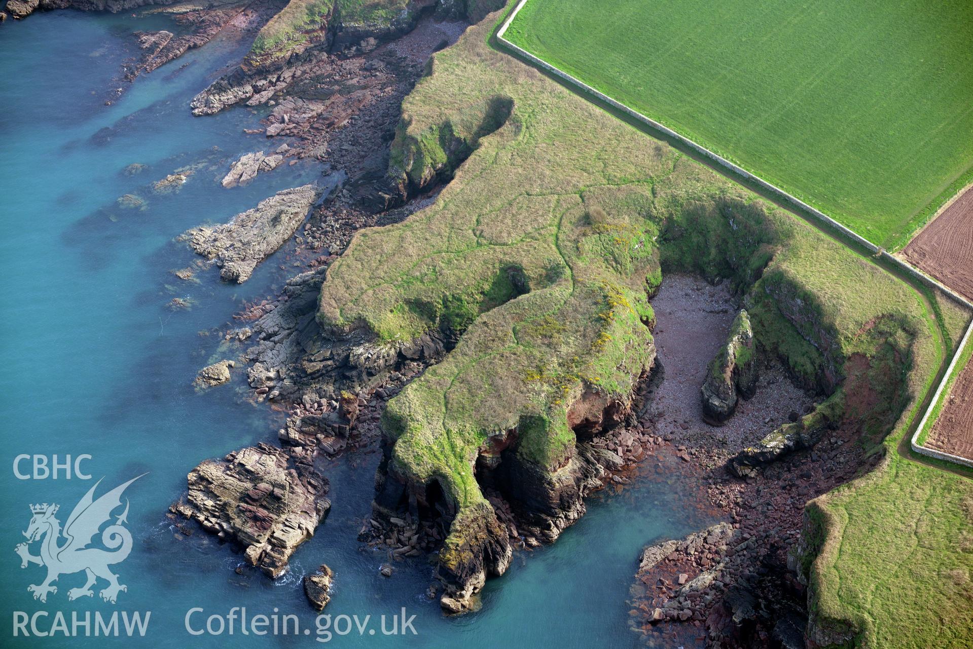 Aerial photography of Castle Head promontory fort taken on 27th March 2017. Baseline aerial reconnaissance survey for the CHERISH Project. ? Crown: CHERISH PROJECT 2017. Produced with EU funds through the Ireland Wales Co-operation Programme 2014-2020. All material made freely available through the Open Government Licence.