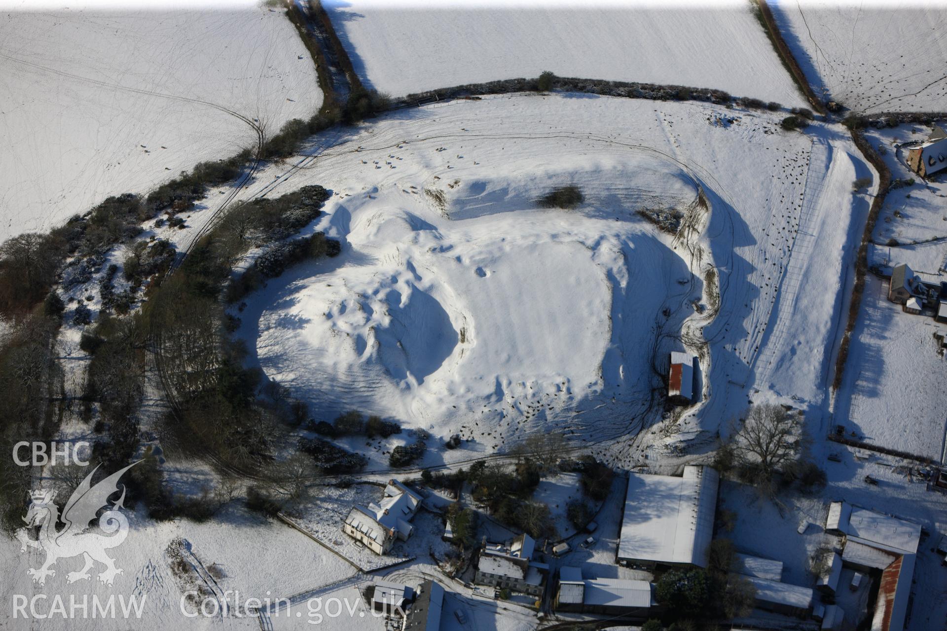 Motte and bailey castle at Painscastle, south east of Builth Wells. Oblique aerial photograph taken during the Royal Commission?s programme of archaeological aerial reconnaissance by Toby Driver on 15th January 2013.