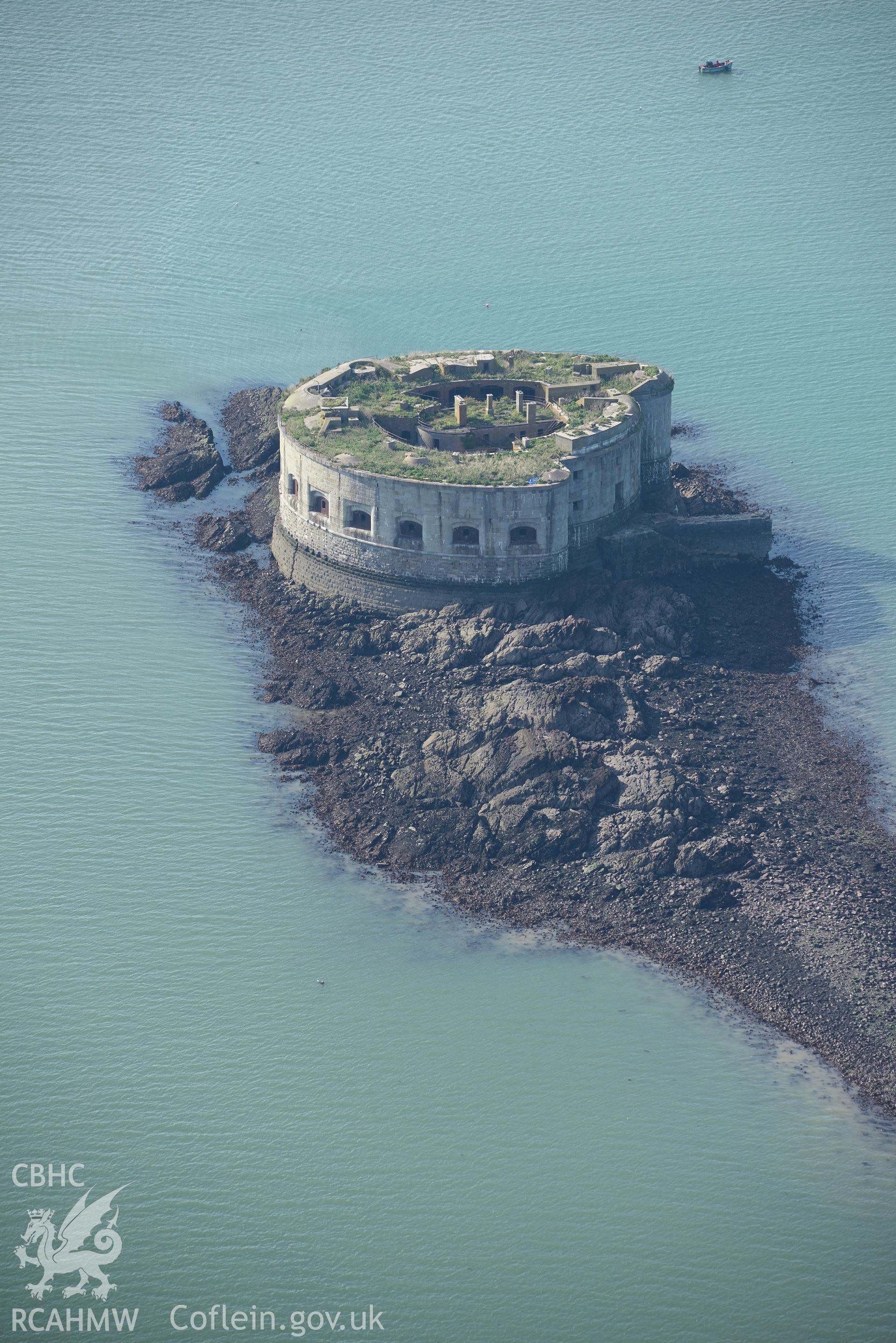 Stack Rock Fort, Milford Haven. Oblique aerial photograph taken during the Royal Commission's programme of archaeological aerial reconnaissance by Toby Driver on 30th September 2015.