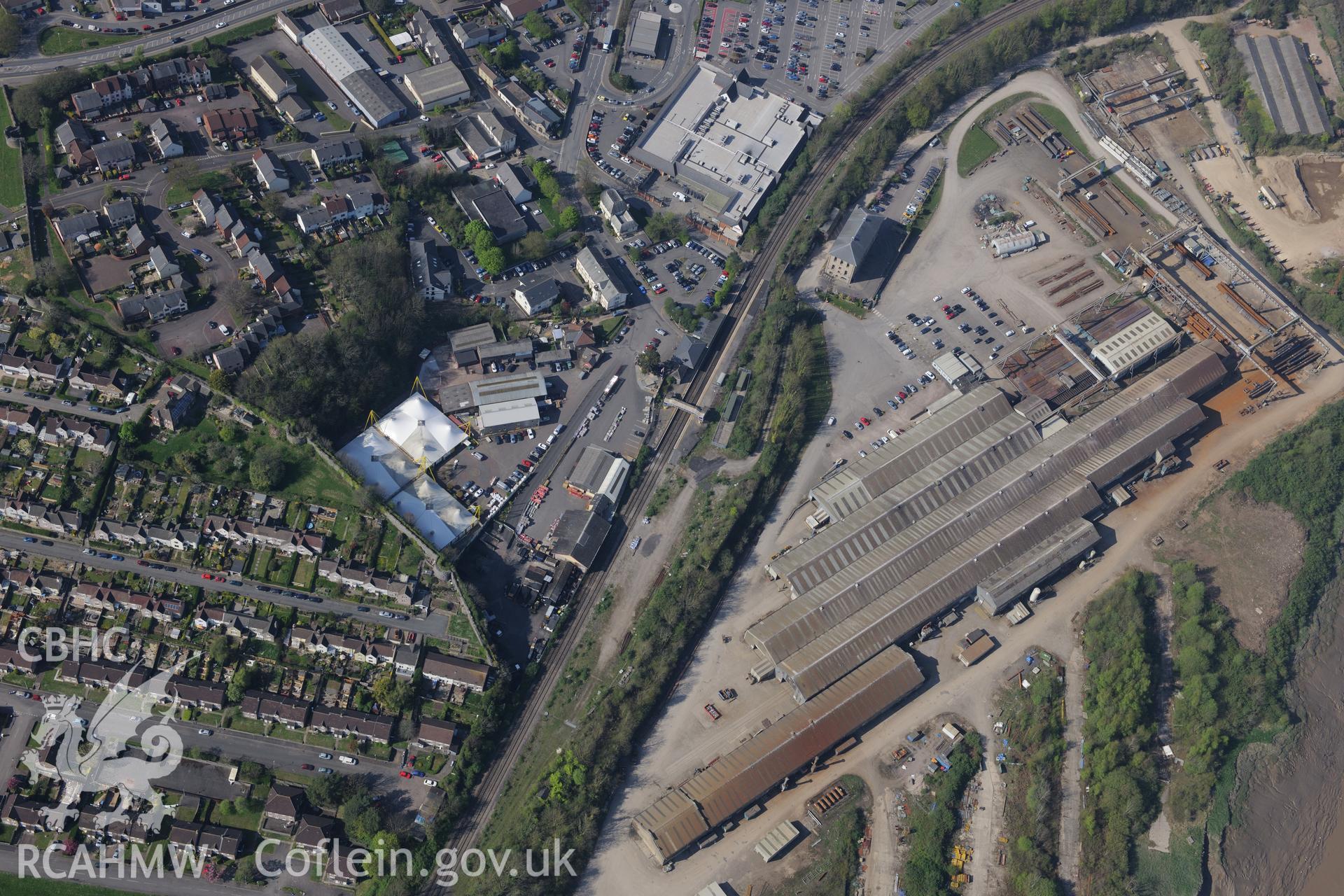 Chepstow including views of the Town Wall, the National Shipyard, the Railway Station, Port Wall School and Sharpe's Steam Flour Mill. Oblique aerial photograph taken during the Royal Commission's programme of archaeological aerial reconnaissance by Toby Driver on 21st April 2015.