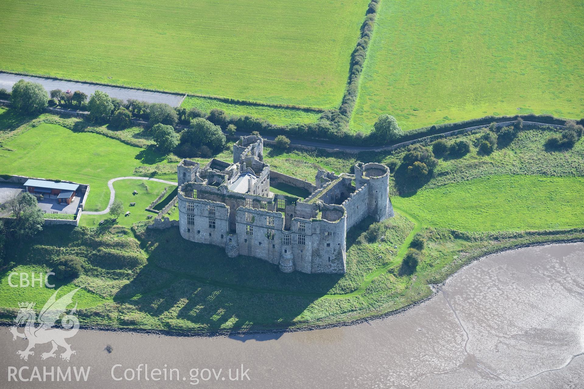 Carew Castle, its gardens and its grounds, Carew, east of Pembroke Dock. Oblique aerial photograph taken during the Royal Commission's programme of archaeological aerial reconnaissance by Toby Driver on 30th September 2015.