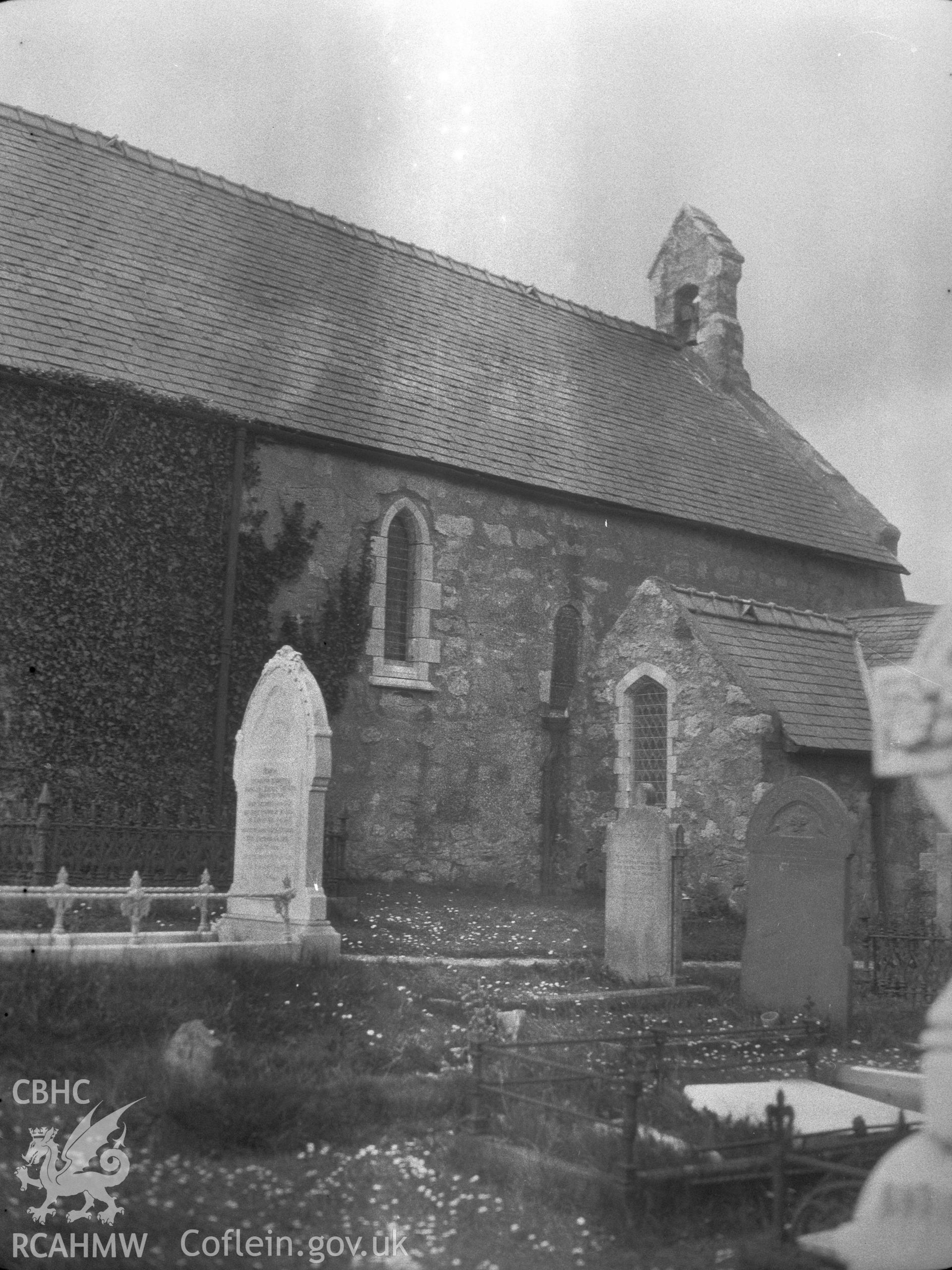 Digital copy of a nitrate negative showing exterior view of north side of St Tudno's Church, Llandudno. From the National Building Record Postcard Collection.