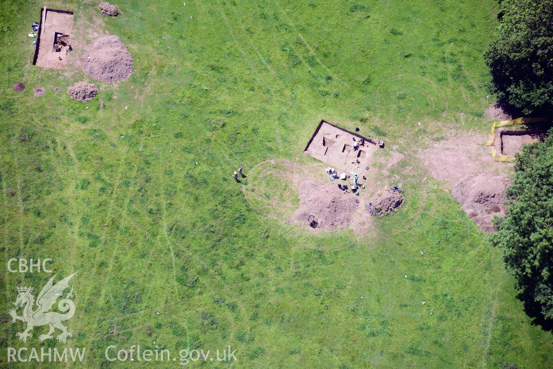 Excavation of Caerau Hillfort, Ely, conducted by Cardiff University. Oblique aerial photograph taken during the Royal Commission's programme of archaeological aerial reconnaissance by Toby Driver on 29th June 2015.