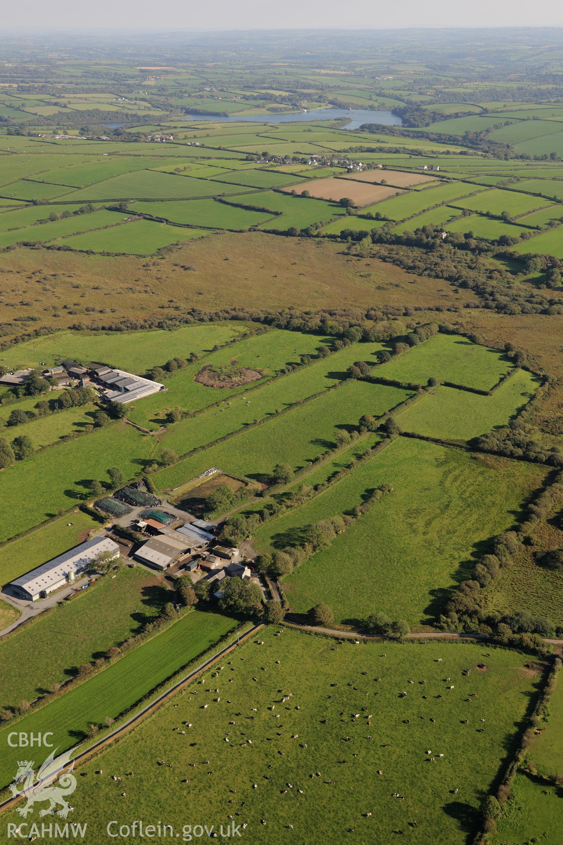 Medieval strip field system between Fleming's Castle farm and the village of Wallis, Pembrokeshire. Oblique aerial photograph taken during the Royal Commission's programme of archaeological aerial reconnaissance by Toby Driver on 30th September 2015.