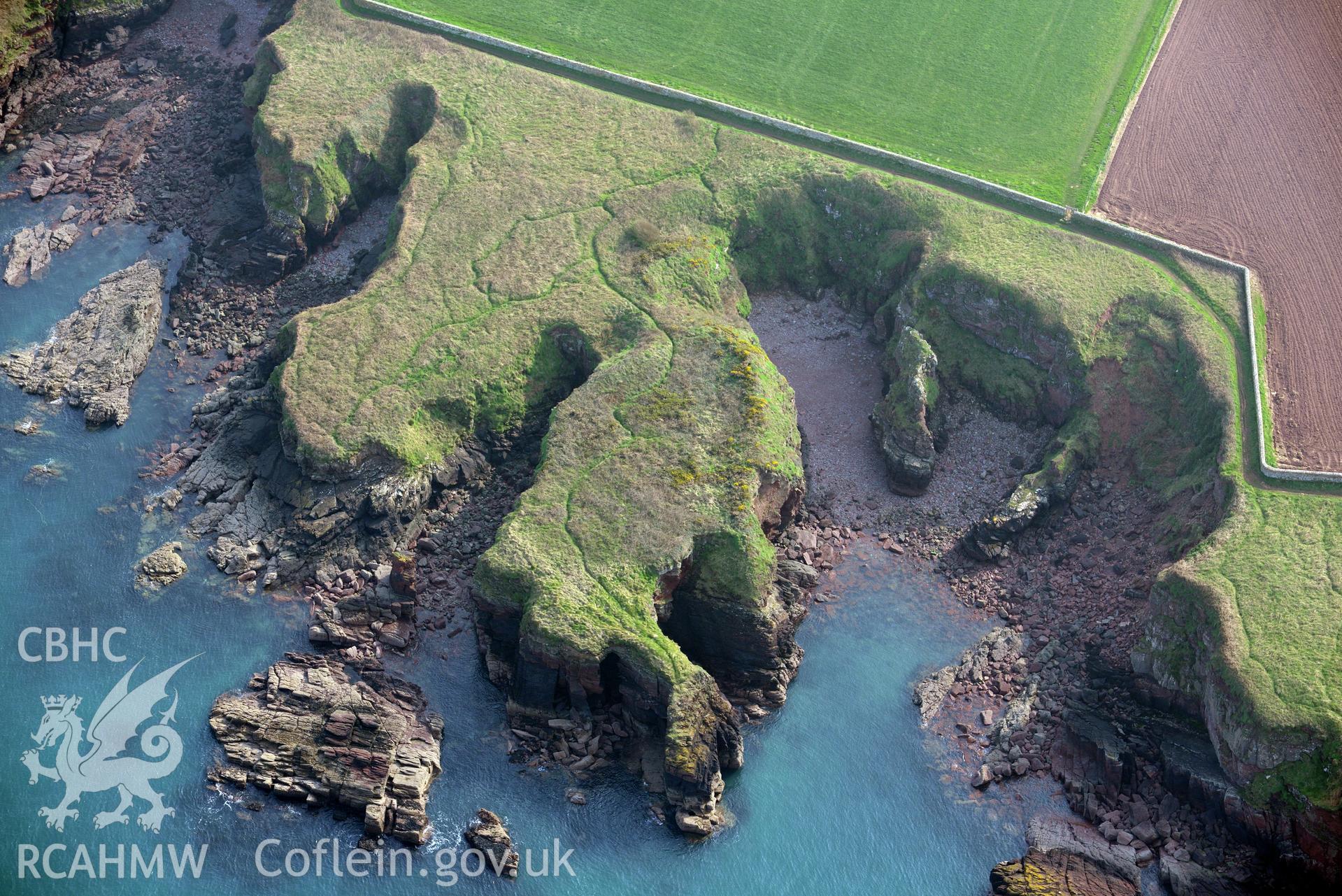 Aerial photography of Castle Head promontory fort taken on 27th March 2017. Baseline aerial reconnaissance survey for the CHERISH Project. ? Crown: CHERISH PROJECT 2017. Produced with EU funds through the Ireland Wales Co-operation Programme 2014-2020. All material made freely available through the Open Government Licence.