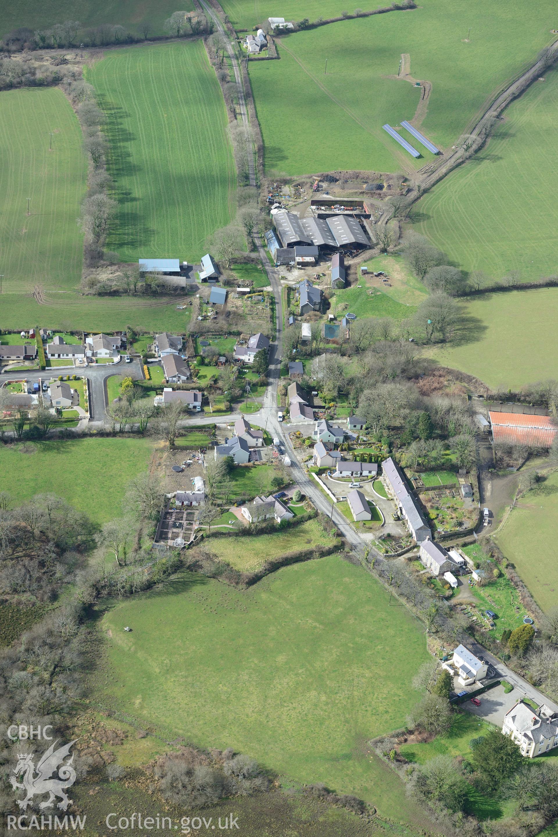 The village of New Moat. Oblique aerial photograph taken during the Royal Commission's programme of archaeological aerial reconnaissance by Toby Driver on 13th March 2015.