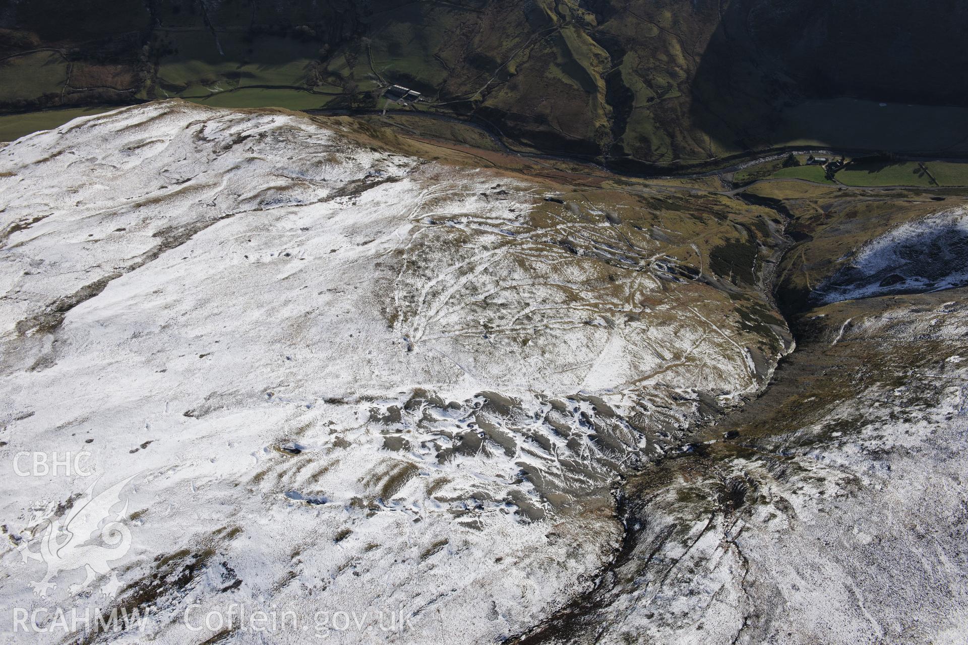 Former Copa Hill opencast mine, Cwmystwyth, south west of Llangurig. Oblique aerial photograph taken during the Royal Commission's programme of archaeological aerial reconnaissance by Toby Driver on 4th February 2015.