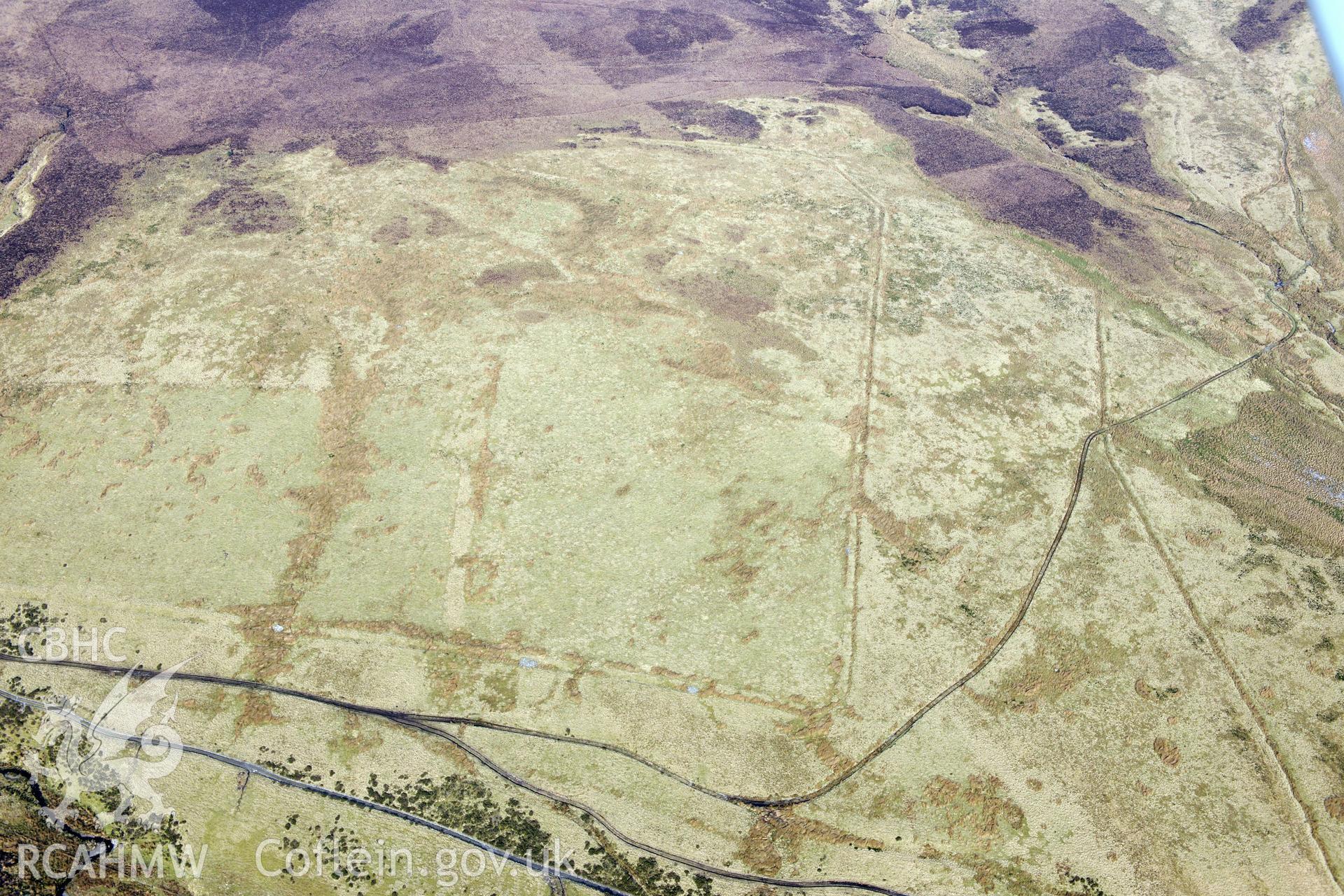 Pen Plaenau Roman Marching Camp, in the Berwyn Mountains south west of Llangollen. Oblique aerial photograph taken during the Royal Commission?s programme of archaeological aerial reconnaissance by Toby Driver on 28th February 2013.