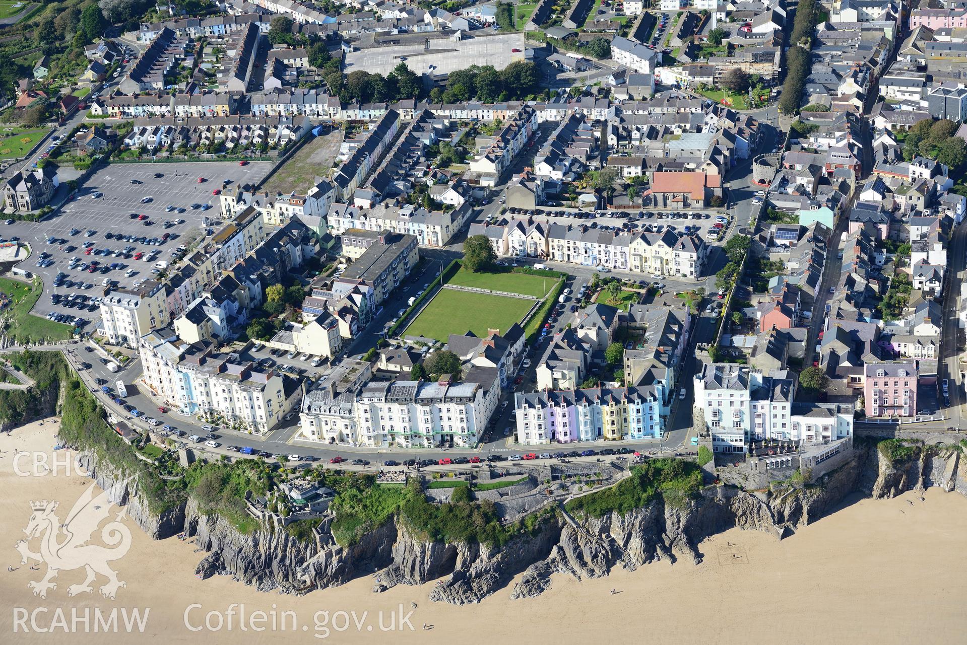 Tenby, its town walls, Imperial Hotel, the Belgrave and Atlantic. Oblique aerial photograph taken during the Royal Commission's programme of archaeological aerial reconnaissance by Toby Driver on 30th September 2015.