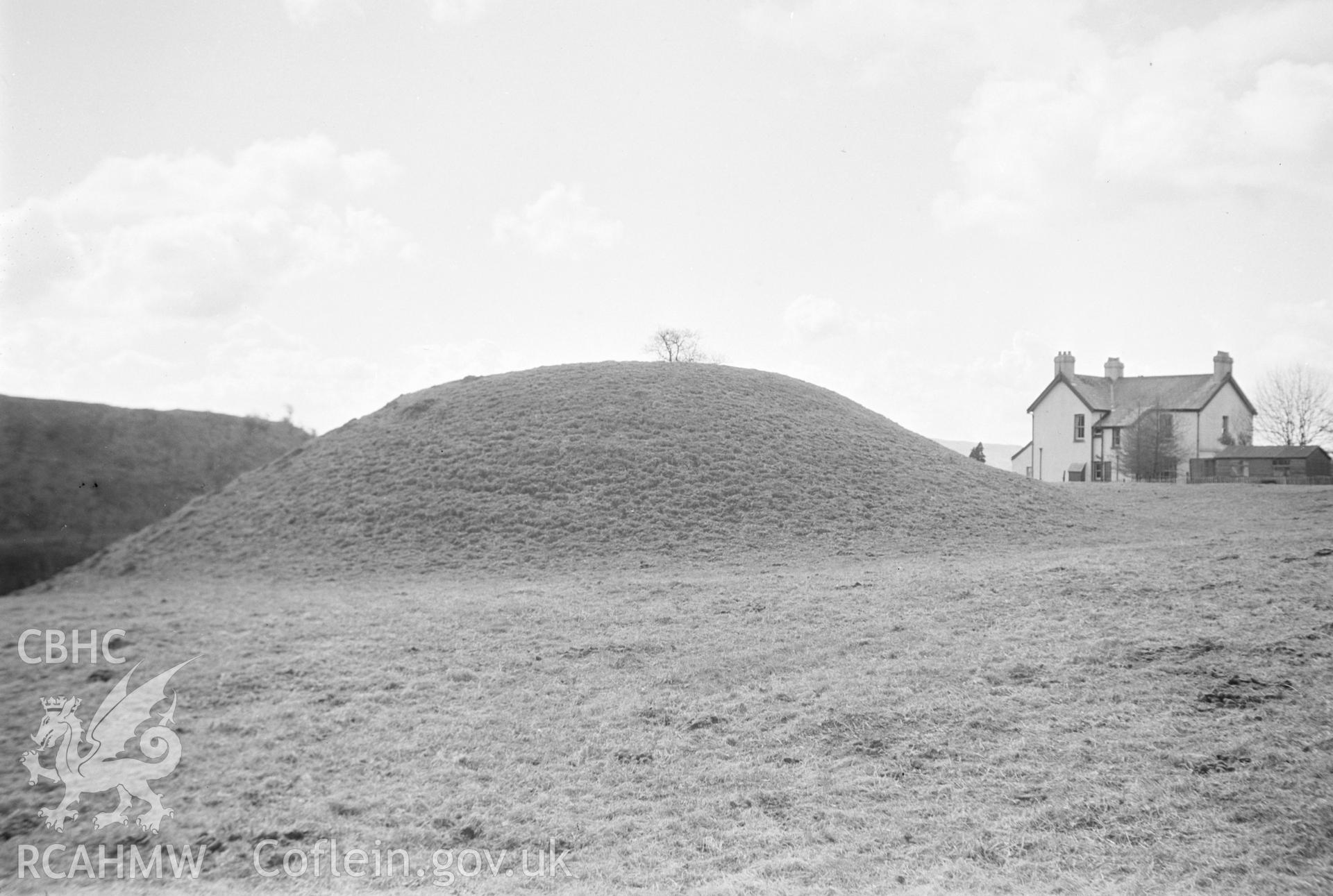 Digital copy of a nitrate negative showing Cae Burdydd mound, Vaynor. From the Cadw Monuments in Care Collection.