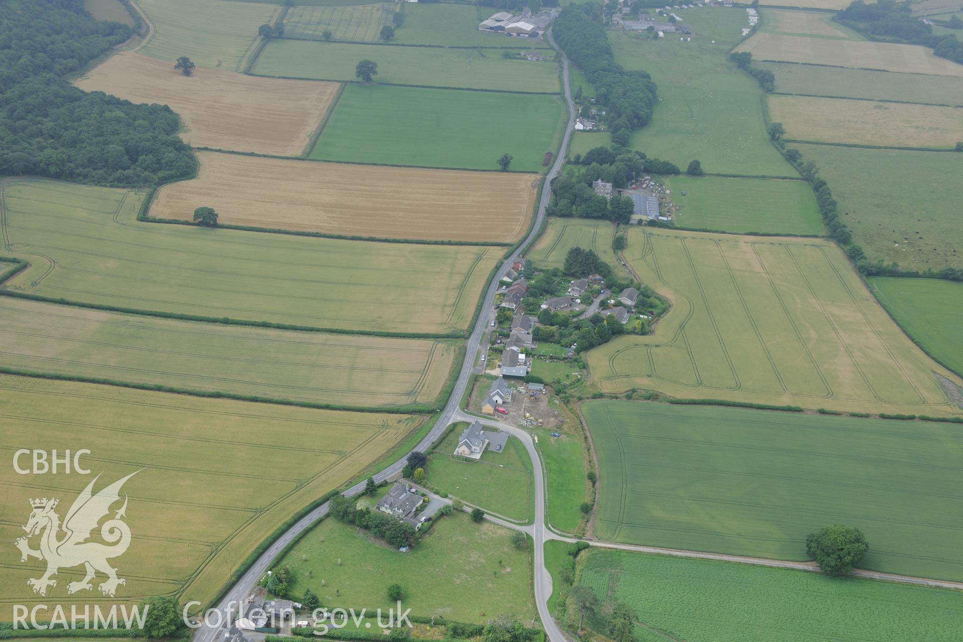 Walton Green barrow, cursus, enclosure complex and cropmark enclosure south of the vicarage at Walton Green, south west of Presteigne. Oblique aerial photograph taken during the Royal Commission?s programme of archaeological aerial reconnaissance by Toby