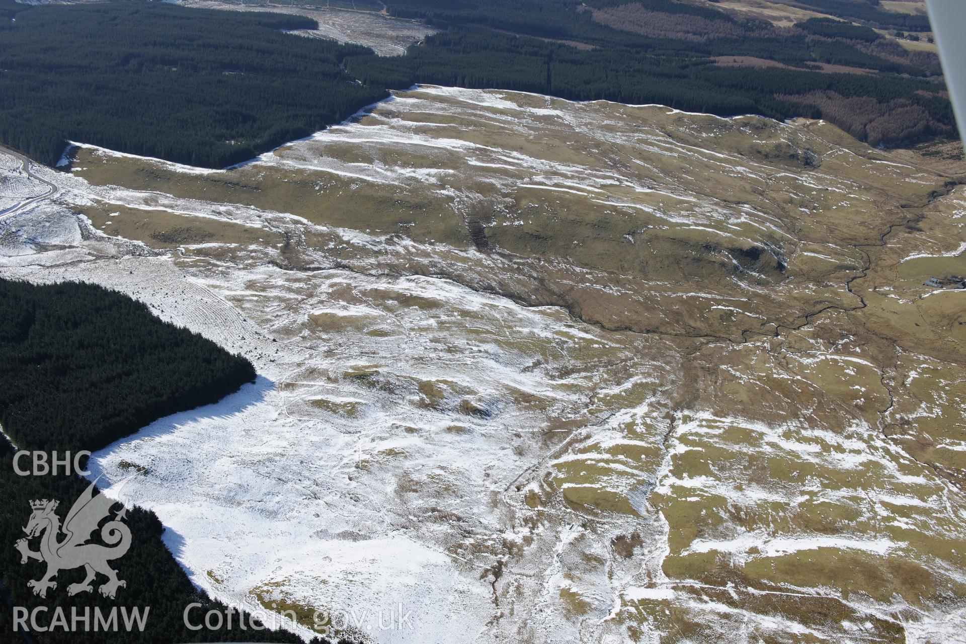 Cairns at Blaen-glasffrwd, south east of Pontrhydfendigaid. Oblique aerial photograph taken during the Royal Commission?s programme of archaeological aerial reconnaissance by Toby Driver on 2nd April 2013.