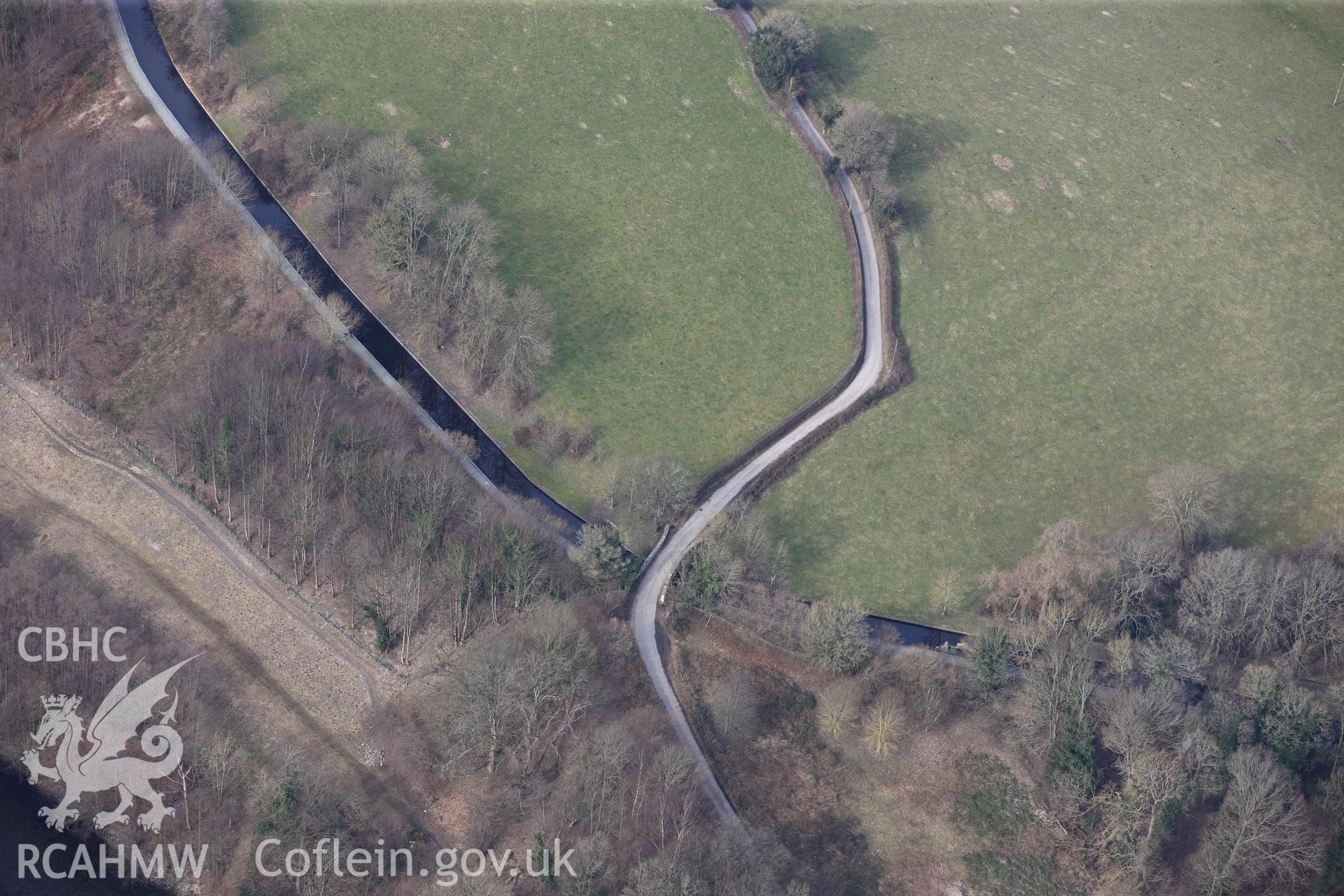 Millars Bridge no. 35, crossing the Llangollen canal west of Froncysyllte. Oblique aerial photograph taken during the Royal Commission?s programme of archaeological aerial reconnaissance by Toby Driver on 28th February 2013.