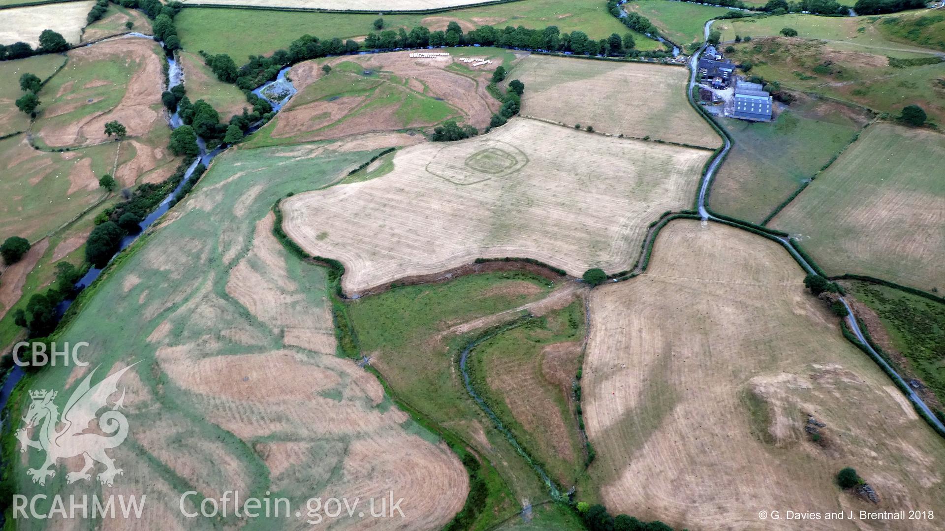 Modified aerial photograph showing crop marks of Ty'n-y-Bryn defended enclosure, Dyffryn Dysynni, north east of Tywyn. Photographed by Glyn Davies and Jonathan Brentnall under drought conditions on 16th July 2018.