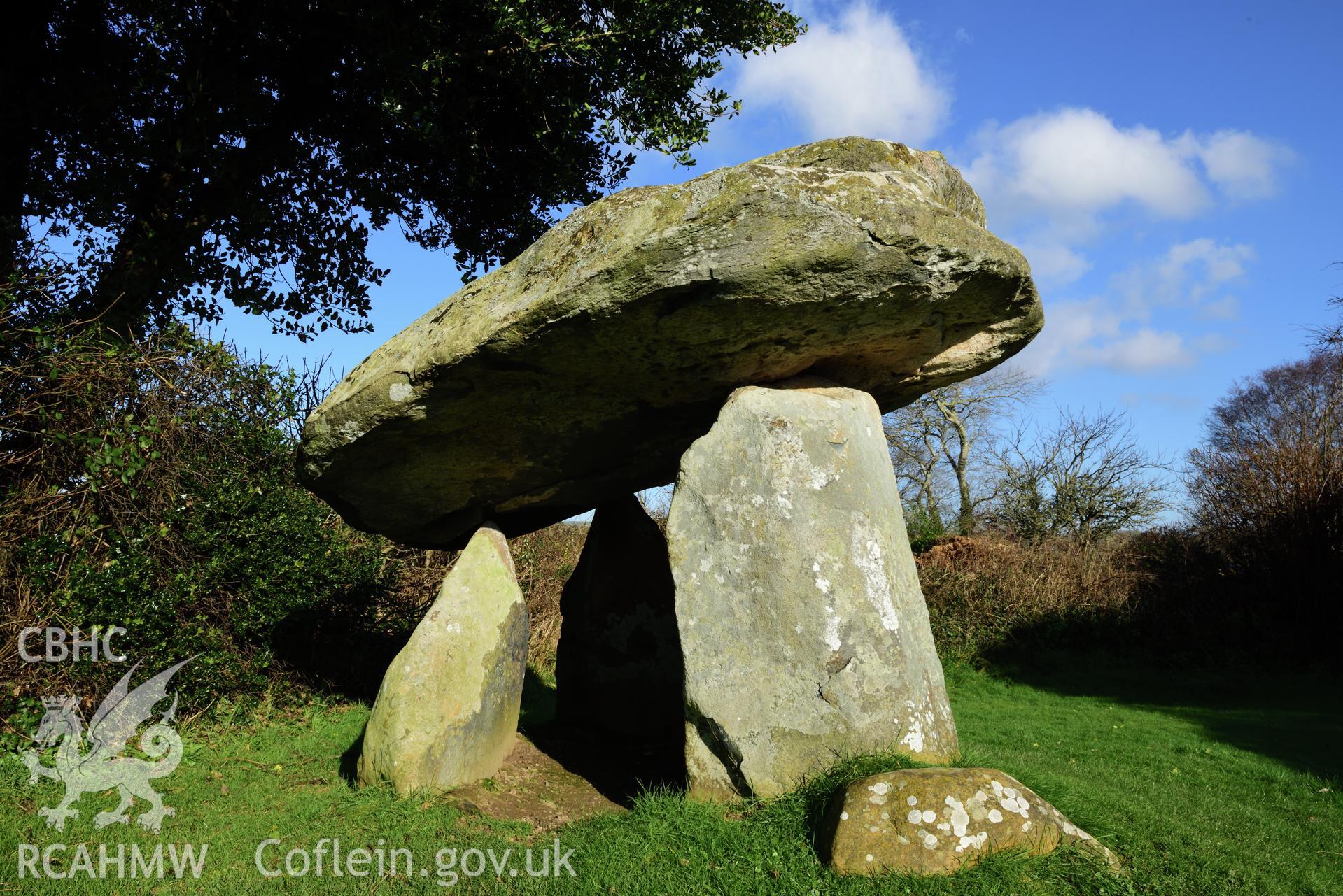 Royal Commission photo survey of Carreg Coetan chambered tomb in winter light, by Toby Driver